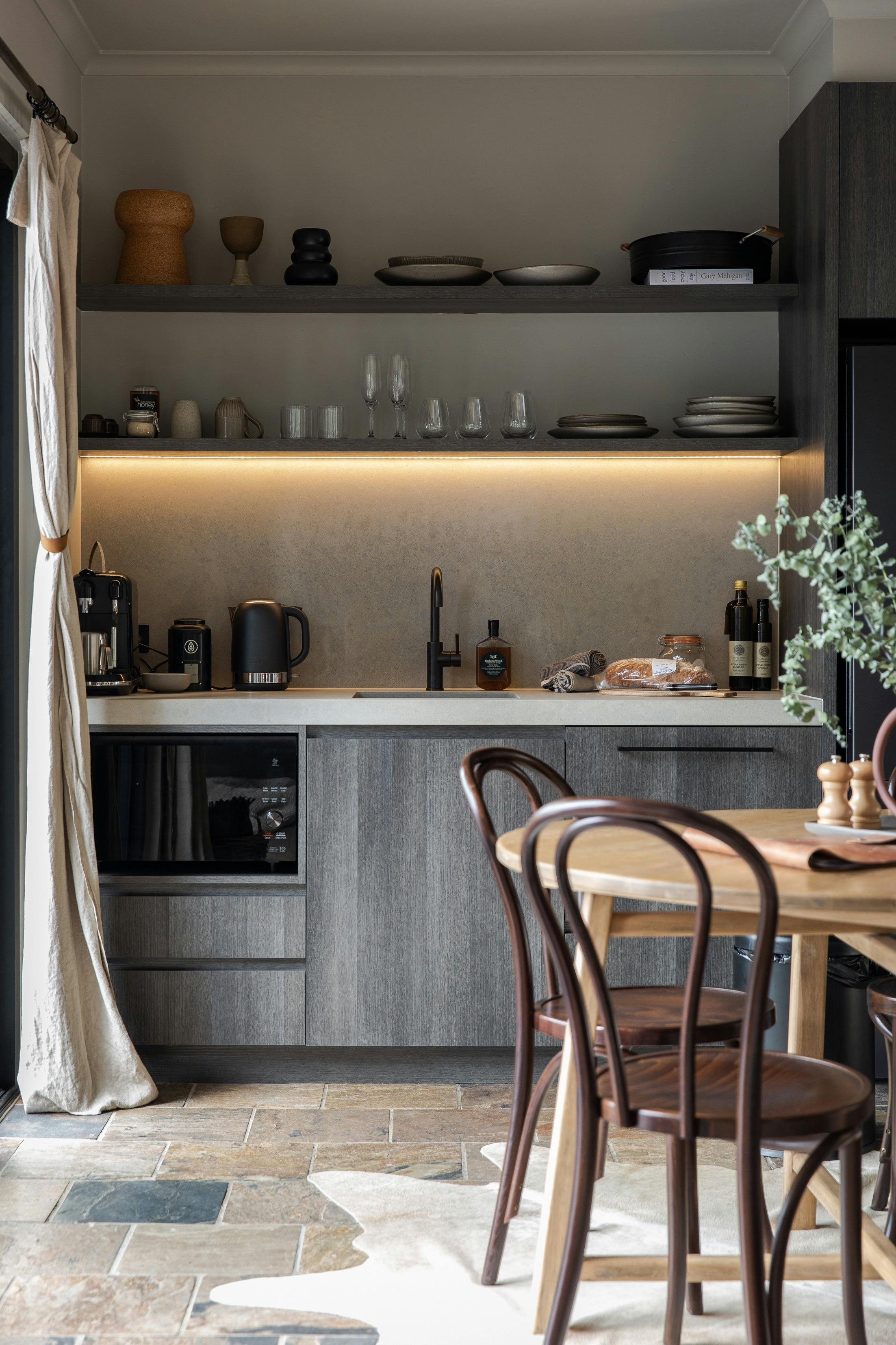 Open plan dining + modern kitchenette in each villa.