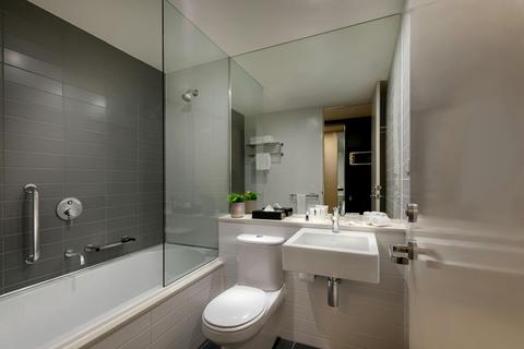 Deluxe Twin Room Bathroom - Shower Over Bath