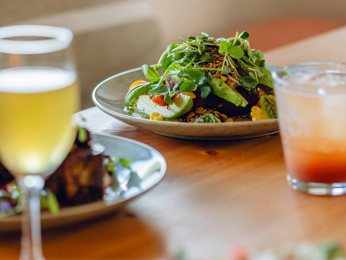 Meals and drinks on the table at CERES Merri Cafe