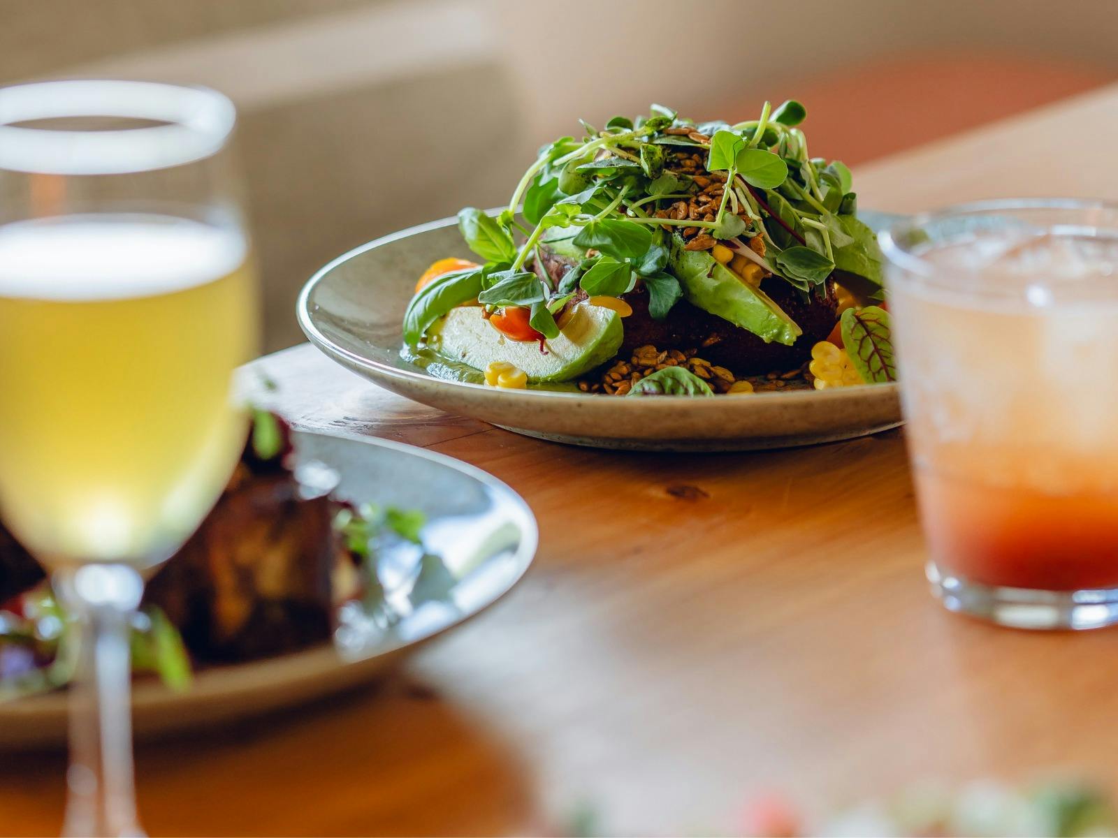 Meals and drinks on the table at CERES Merri Cafe