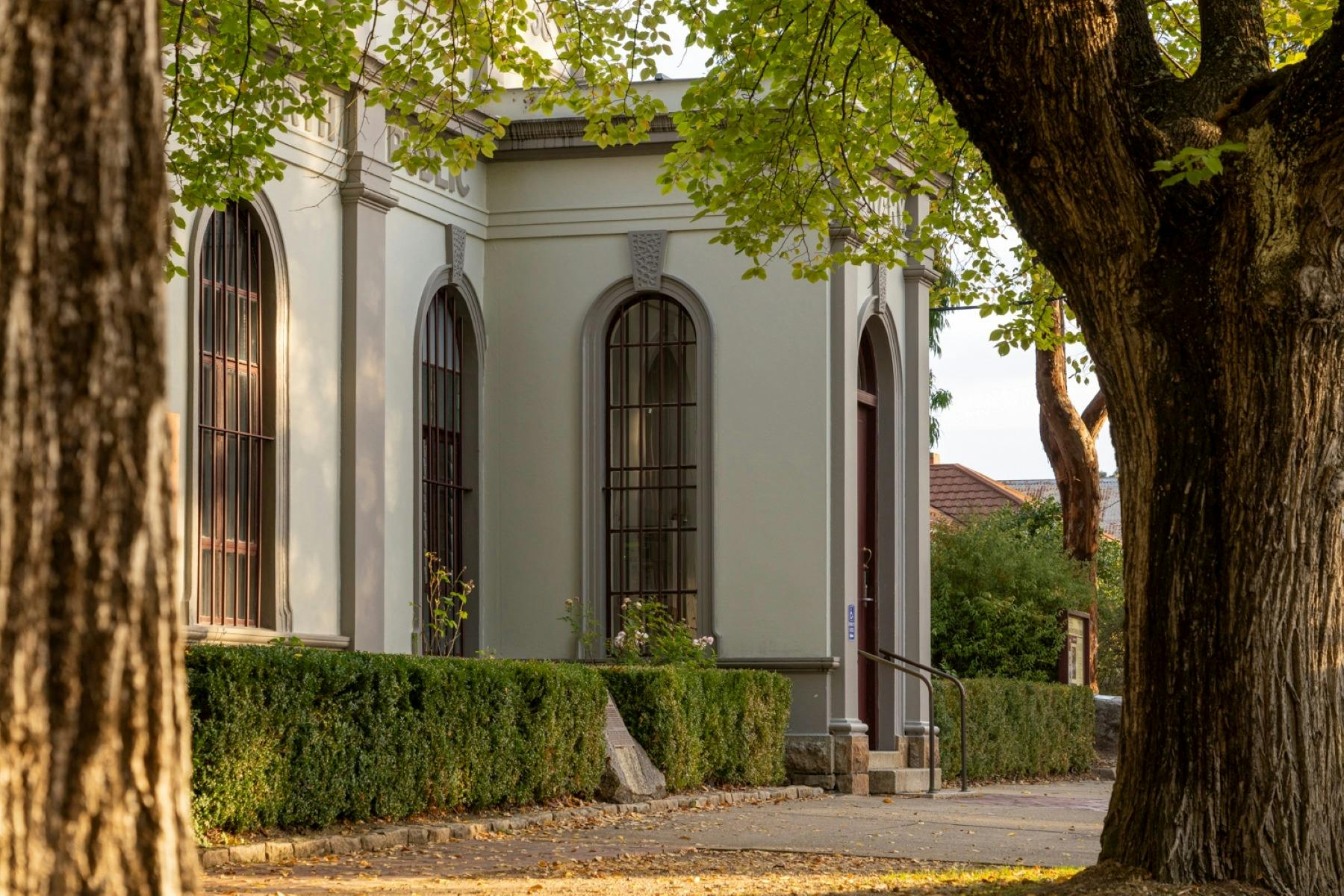 The Burke Museum Beechworth front facade from left angle through trees