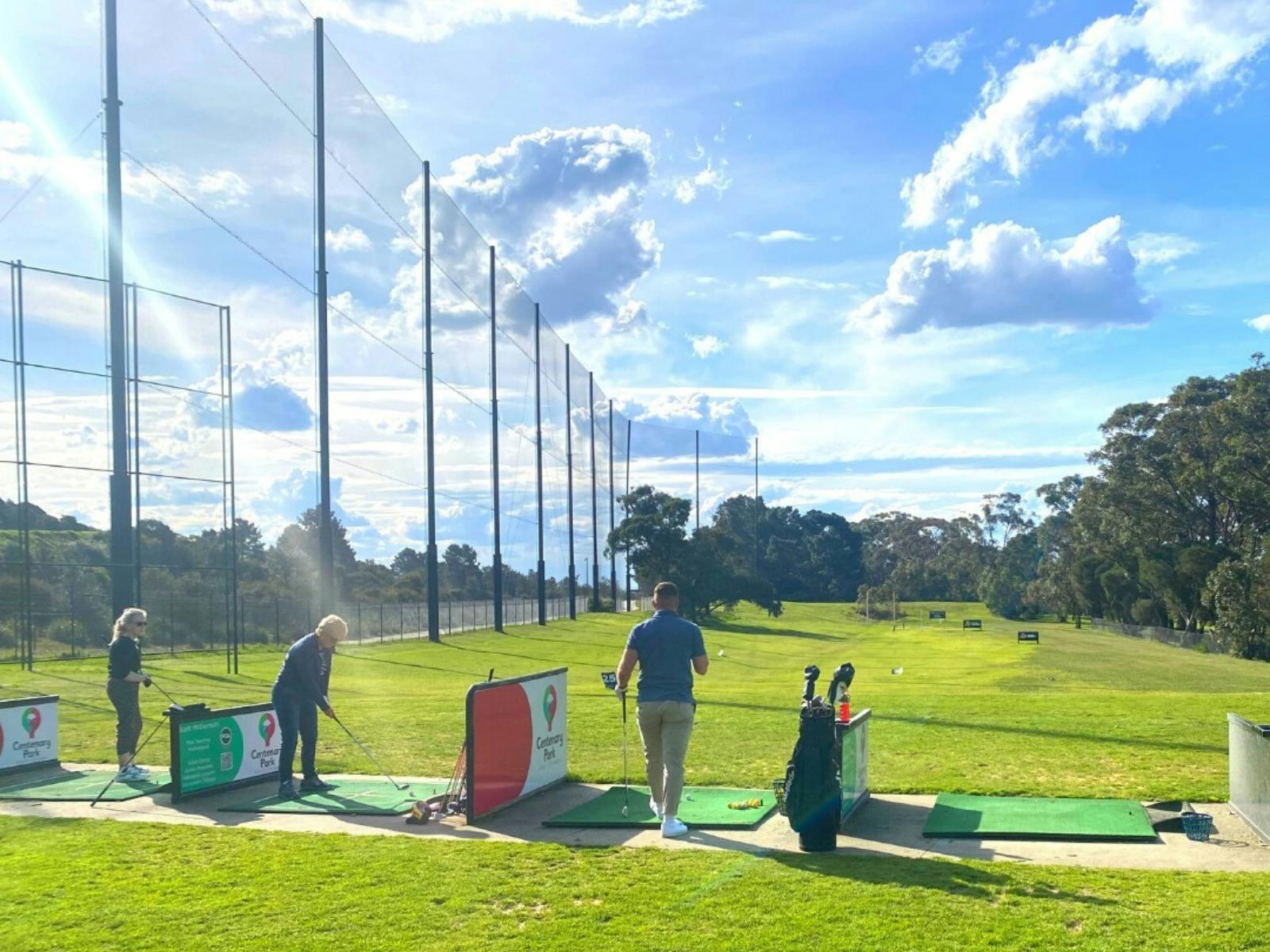 Getting some golf practice in at the driving range at Centenary Park Golf Course