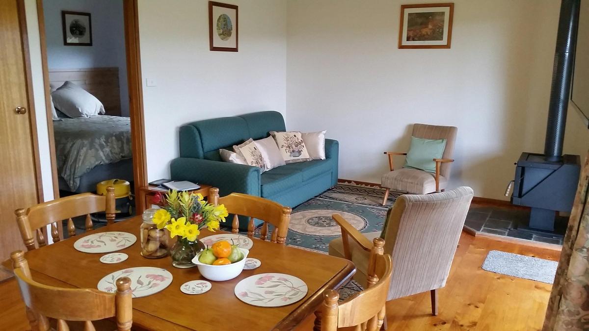 Main living area includes kitchen and lounge area with sofa bed for 2 extra guests