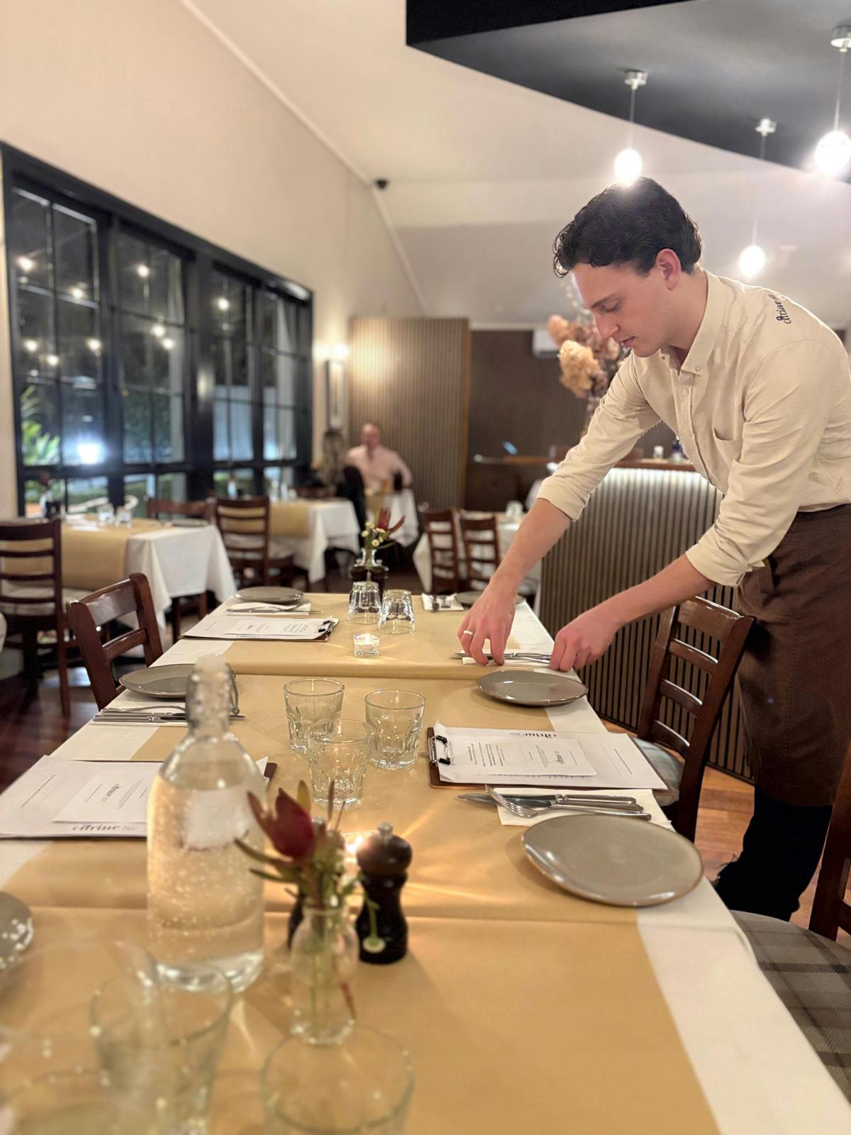 Josh setting the tables