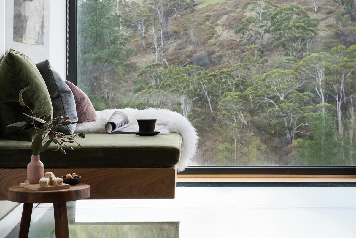Infinity daybed over glass floor
