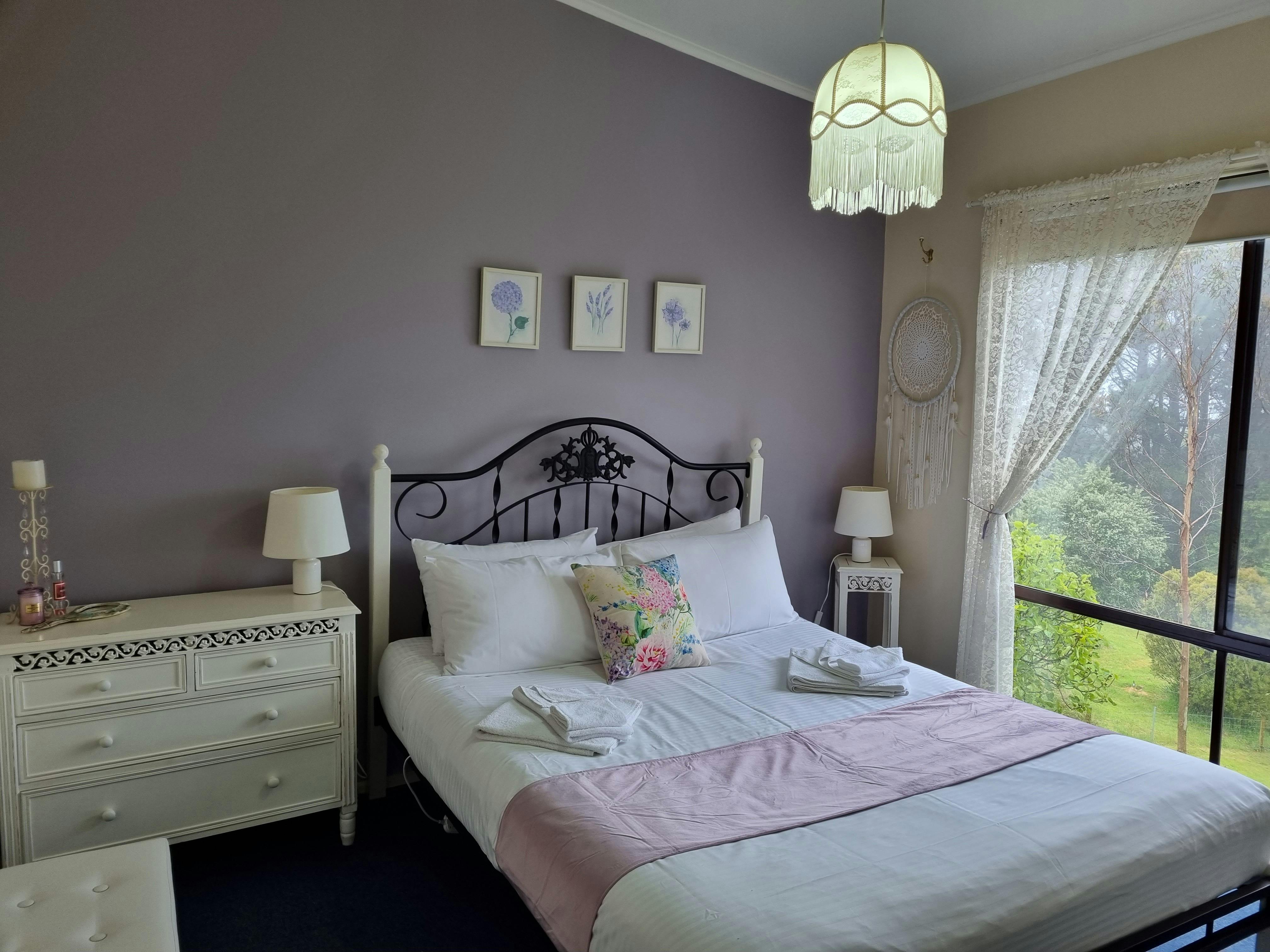 Bedroom 1 with queen bed in Beech Forest Cottage
