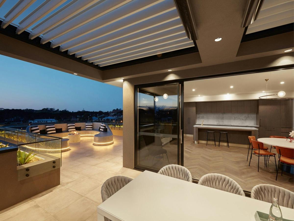Luxury Exclusive Penthouse Outdoor dining area with BBQ and TV