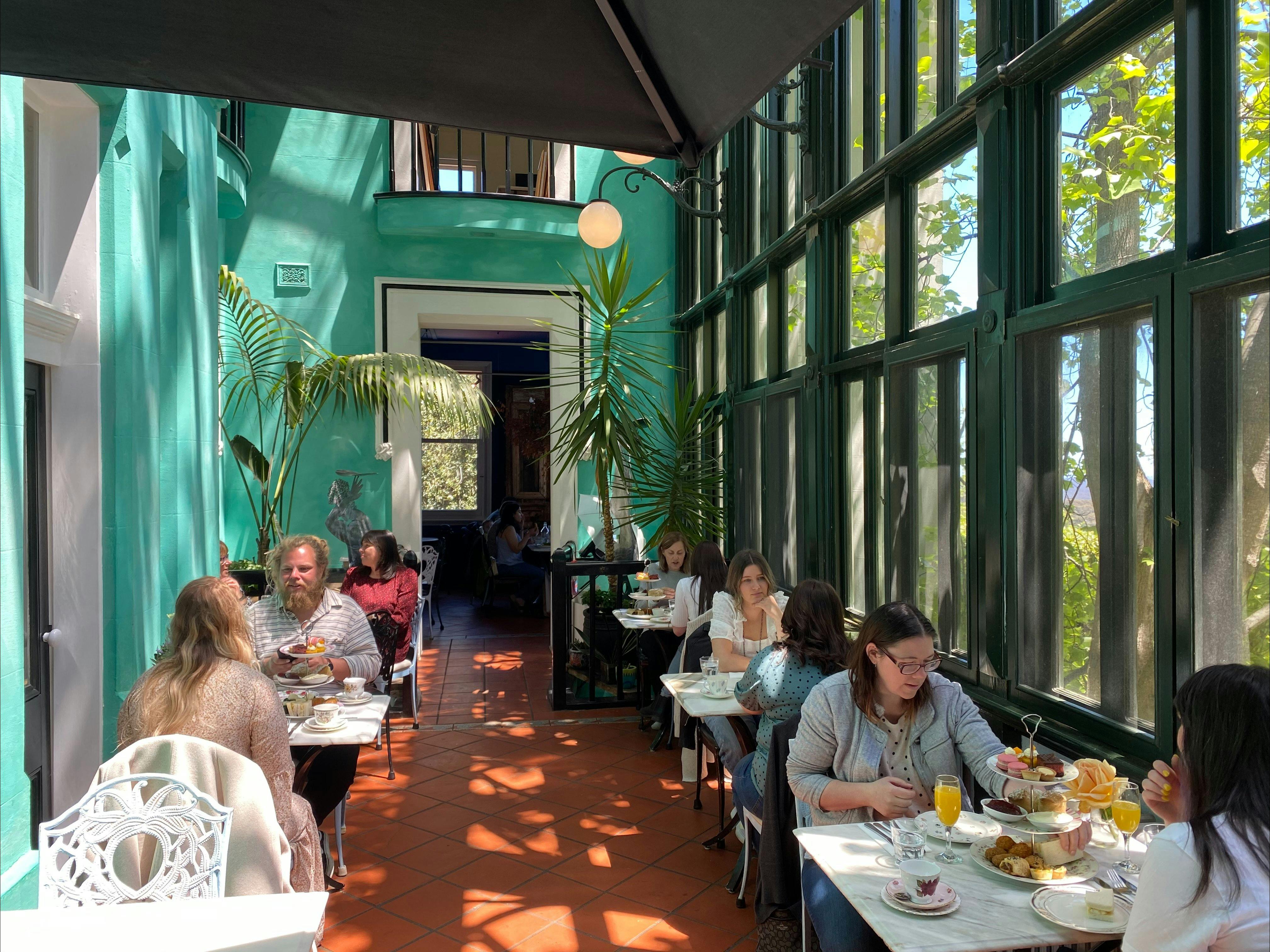diners in sunlit café