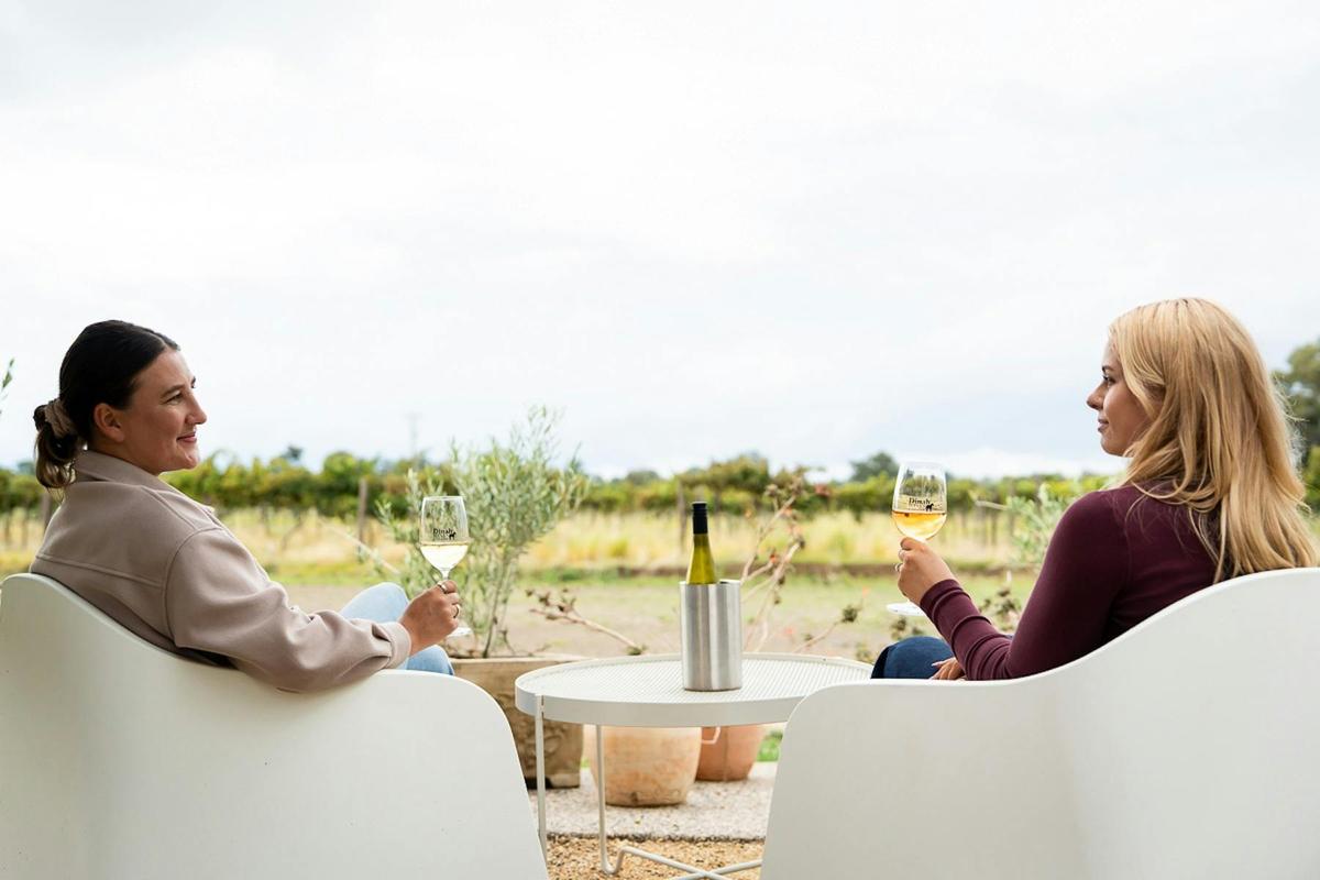 Dinah Wines enjoying the wine.