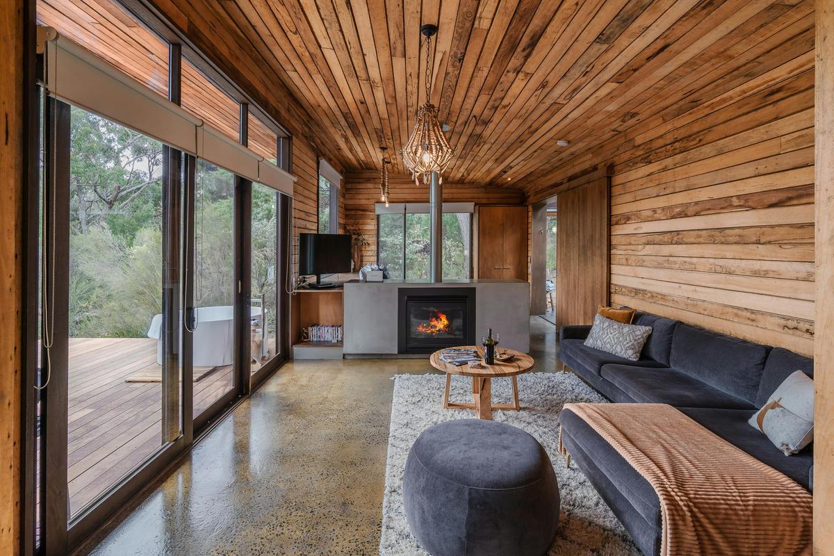 Photo of a lounger area with a log fire