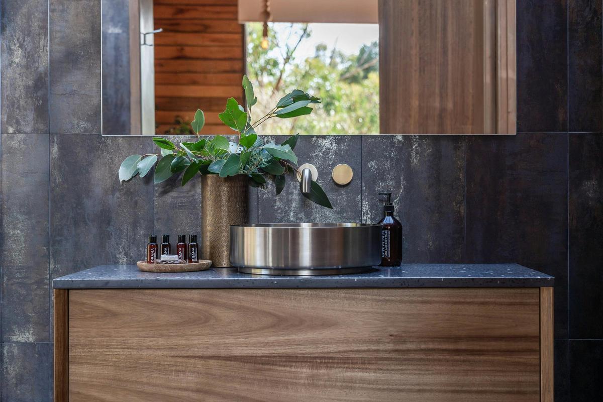 Close shot of bathroom sink with window view