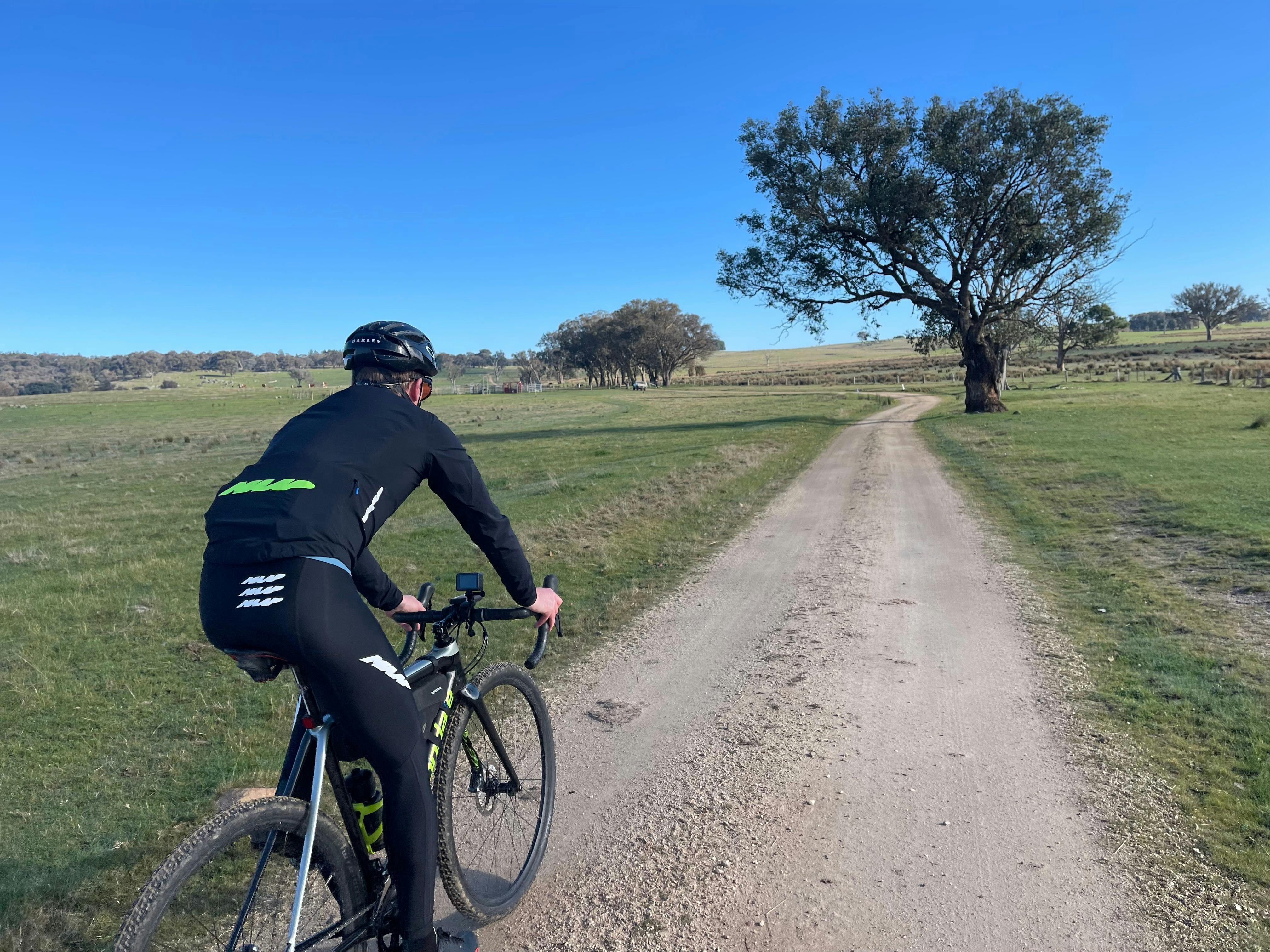 Cyclist on gravel road