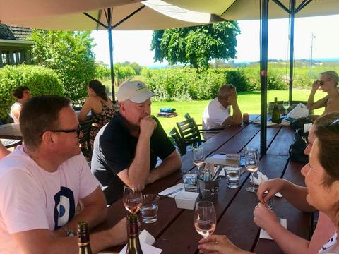 Relaxed lunch at a winery after morning cycle
