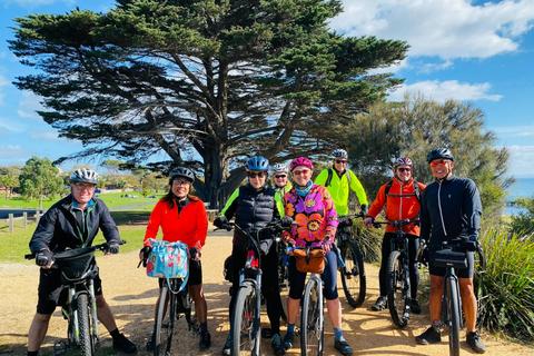 Group of happy cyclists riding the Bellarine Coastal Trail near Portarlington