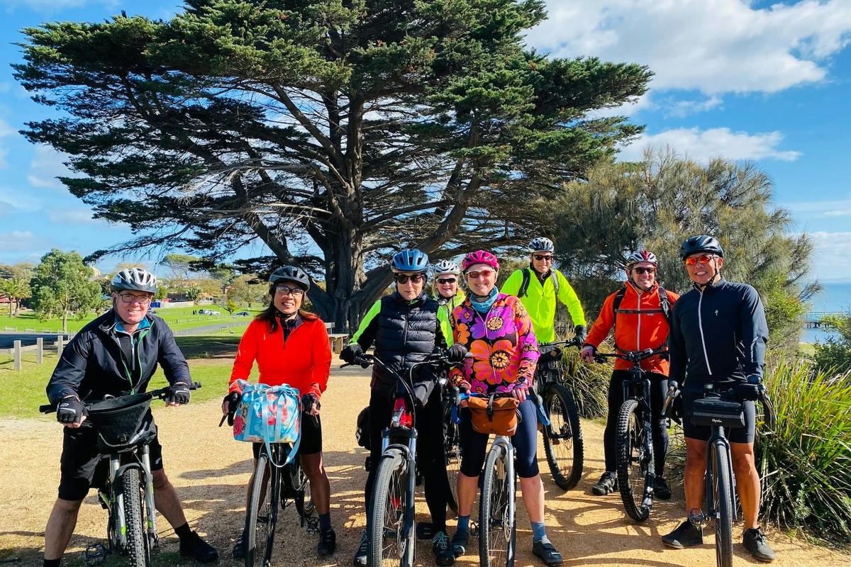 Group of happy cyclists riding the Bellarine Coastal Trail near Portarlington
