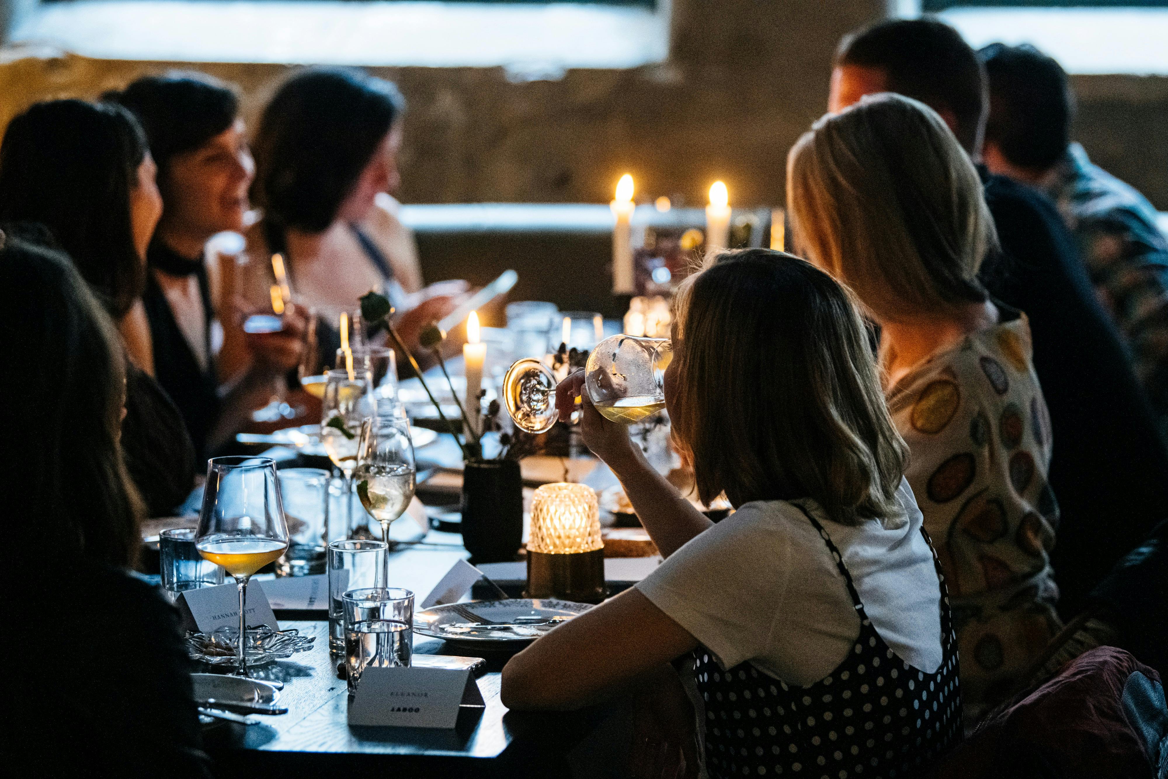 Long table of friends at Dessous