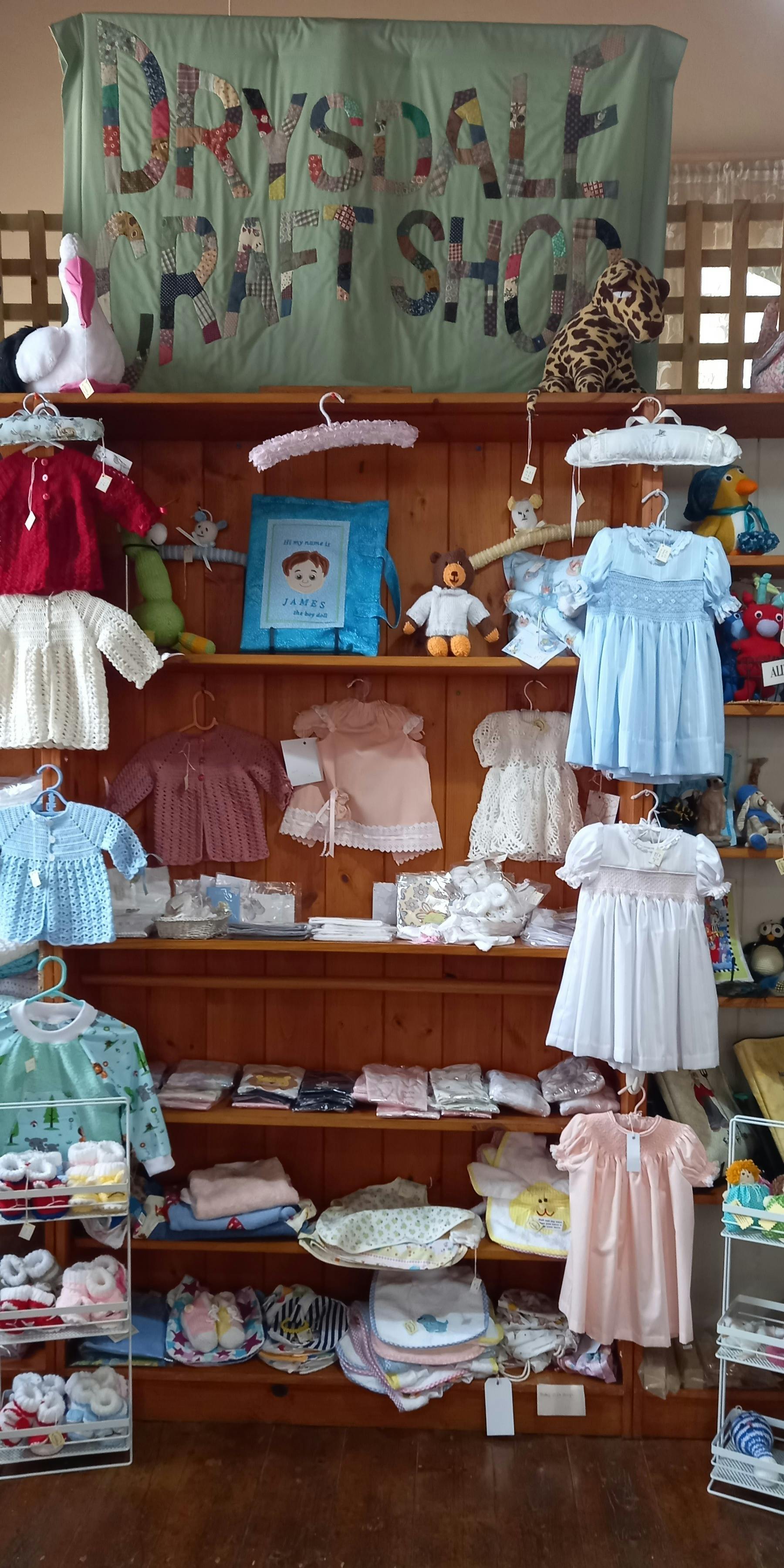 Smocked Baby Dresses And Crocheted Jackets.