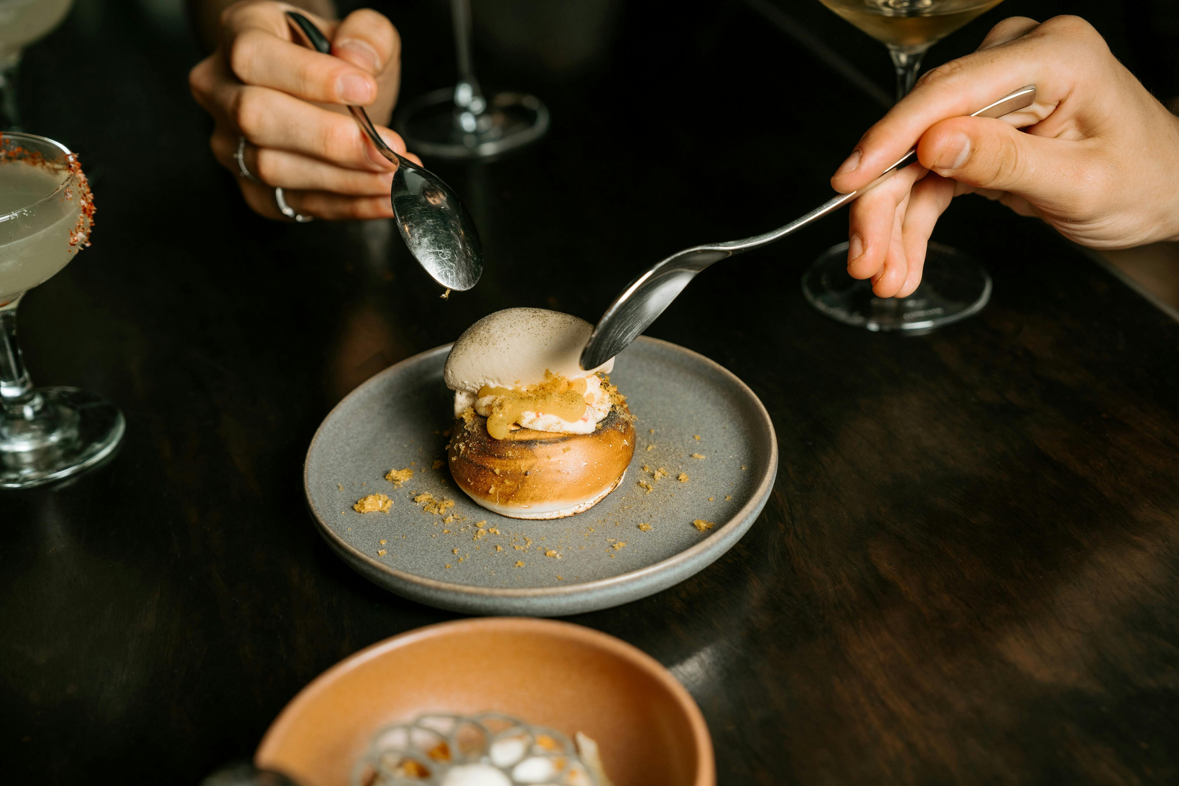 Charred pavlova, mandarin curd and jasmine tea ice cream