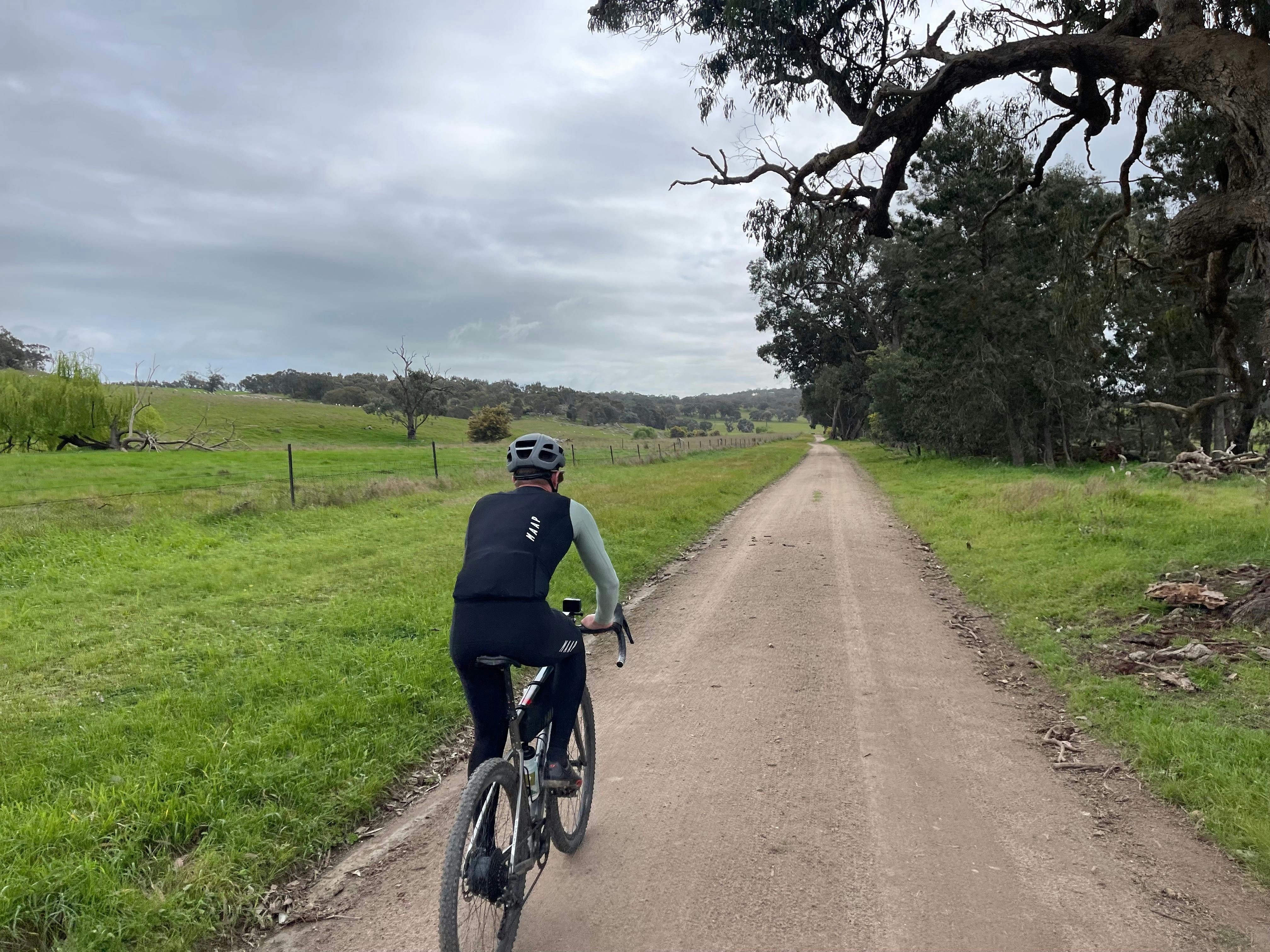 Cyclist on gravel road