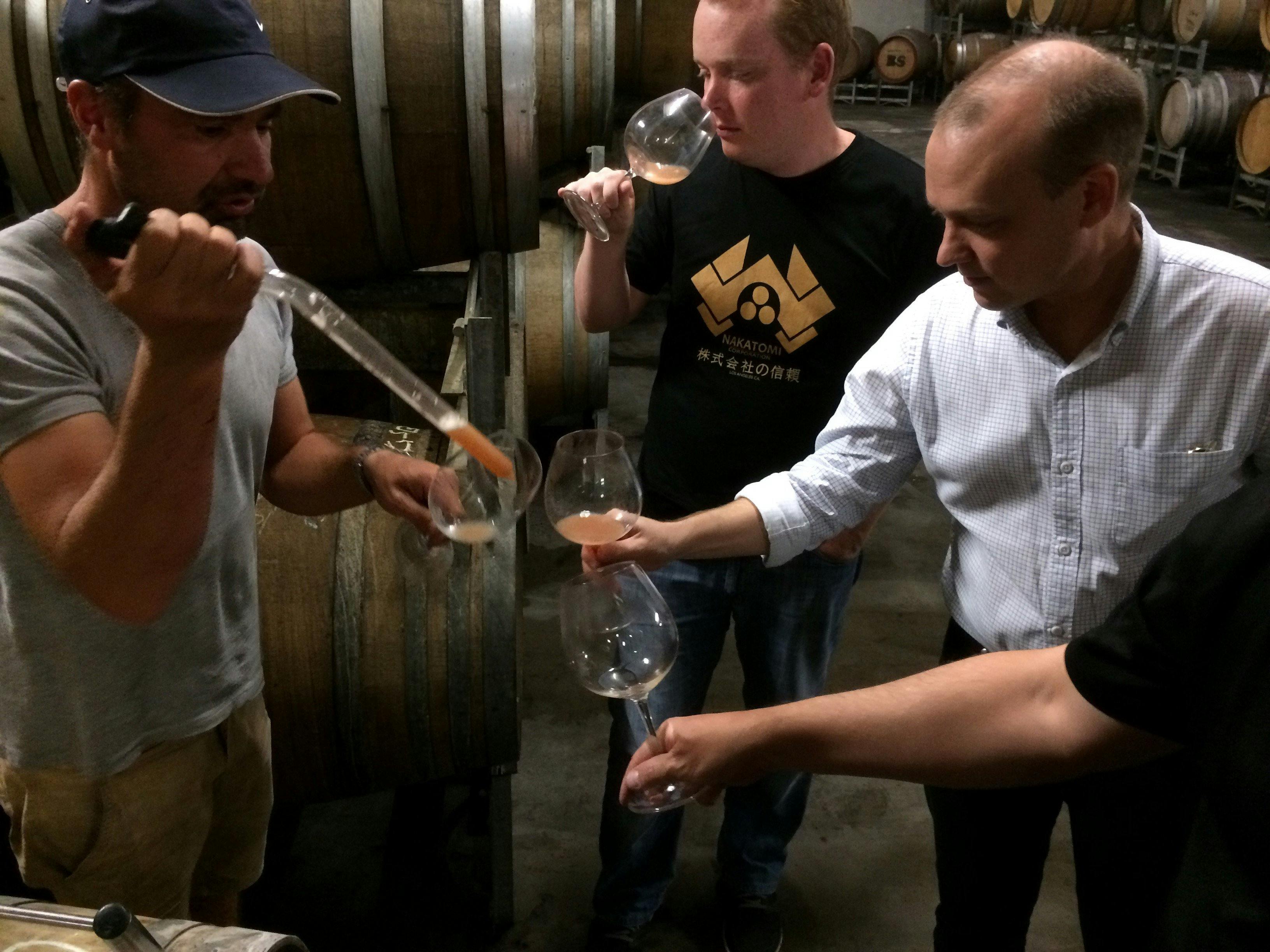 Personel wine tasting straight from the barrel