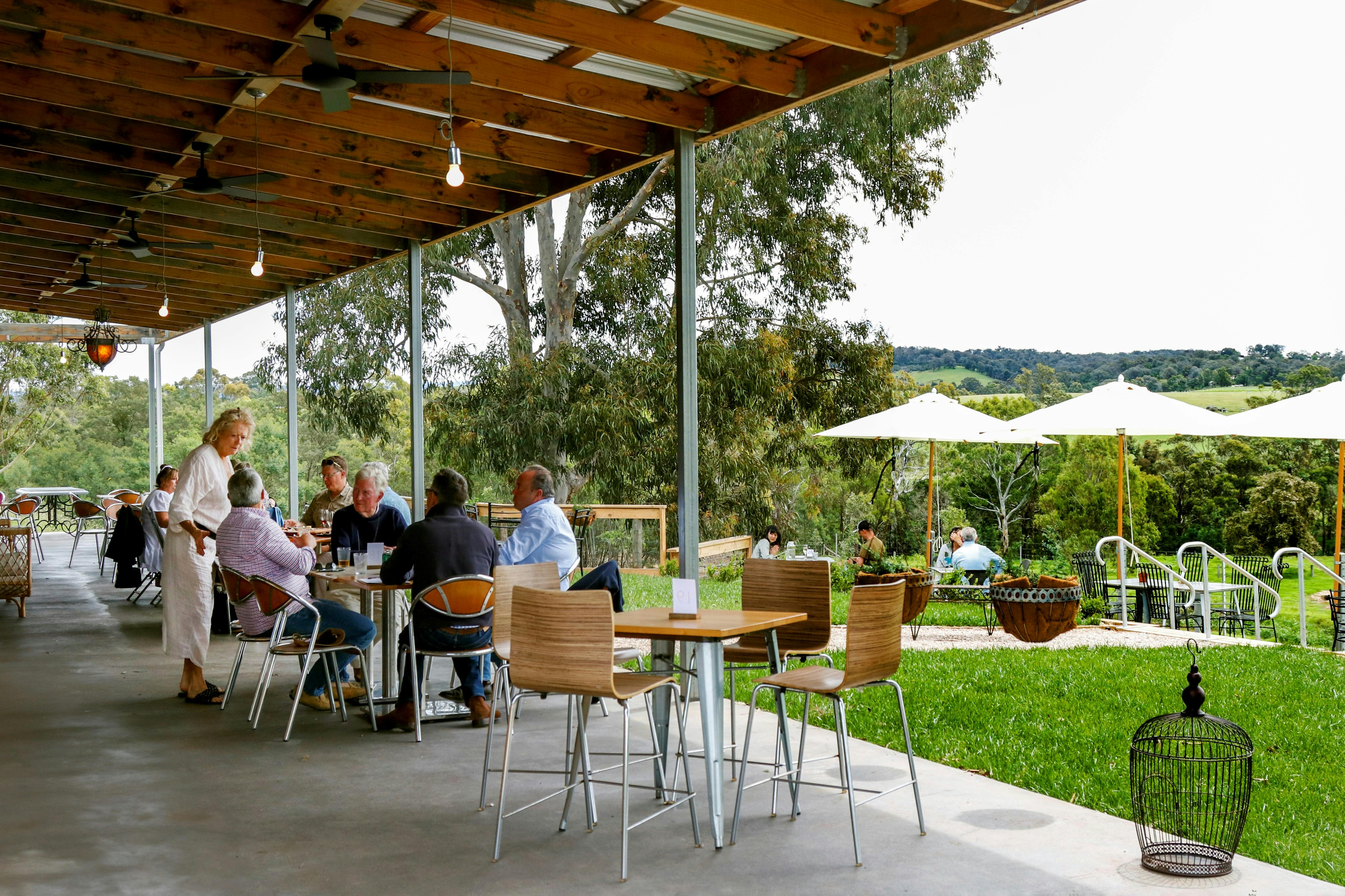 Guests on the veranda, overlooking the decking at Glenmaggie Wines Cellar Door