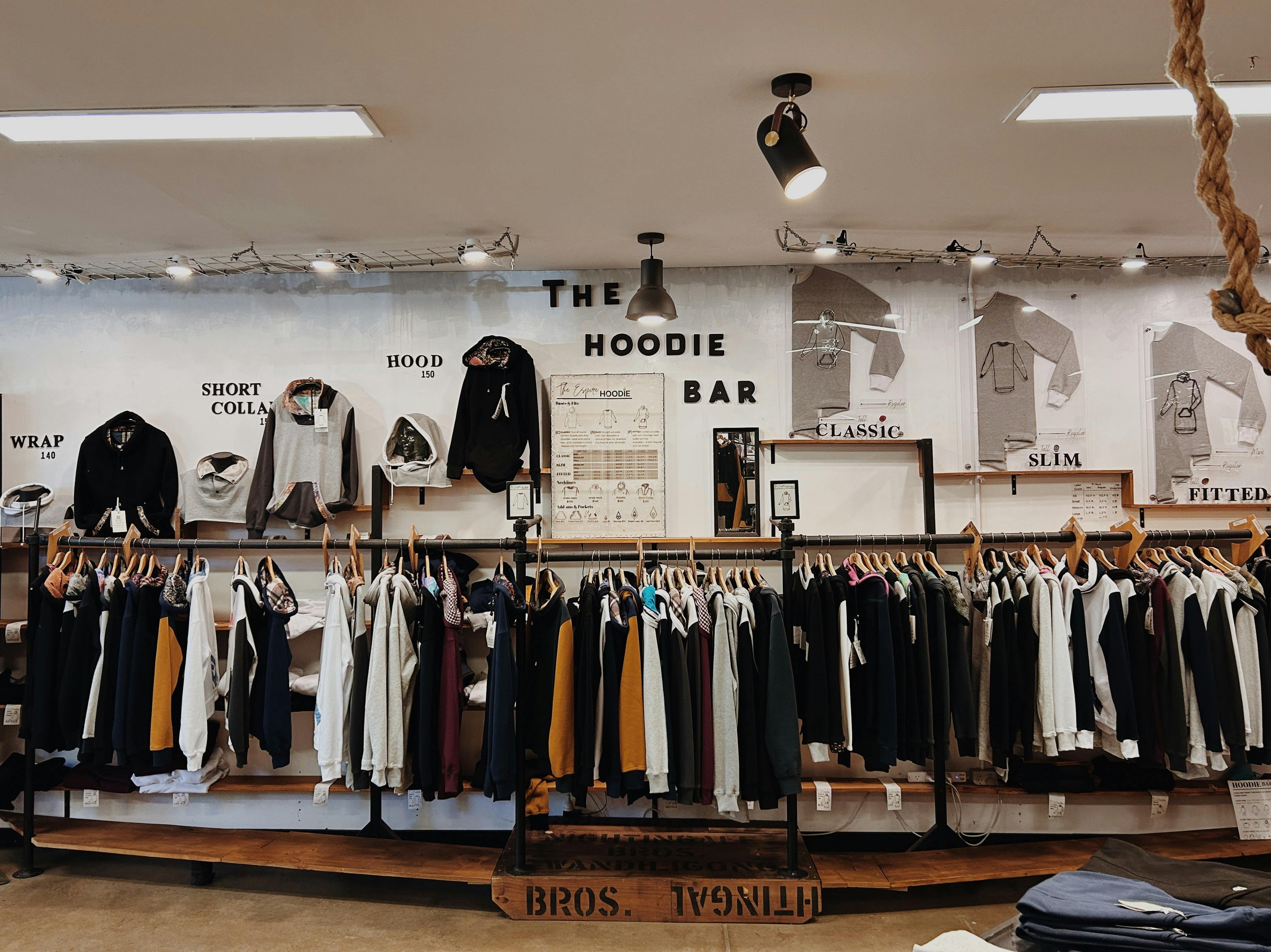 The Hoodie Bar, a rack of custom designed hoodies