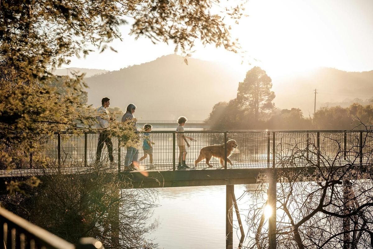 Family walking with dog at Eildon Pondage