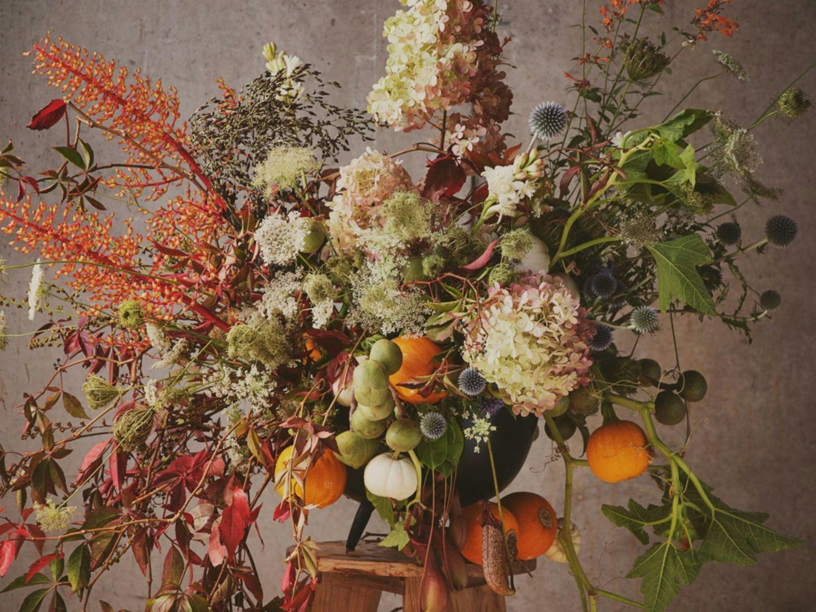 A warm and abundant floral arrangement by Melbourne florist, Flowers Vasette
