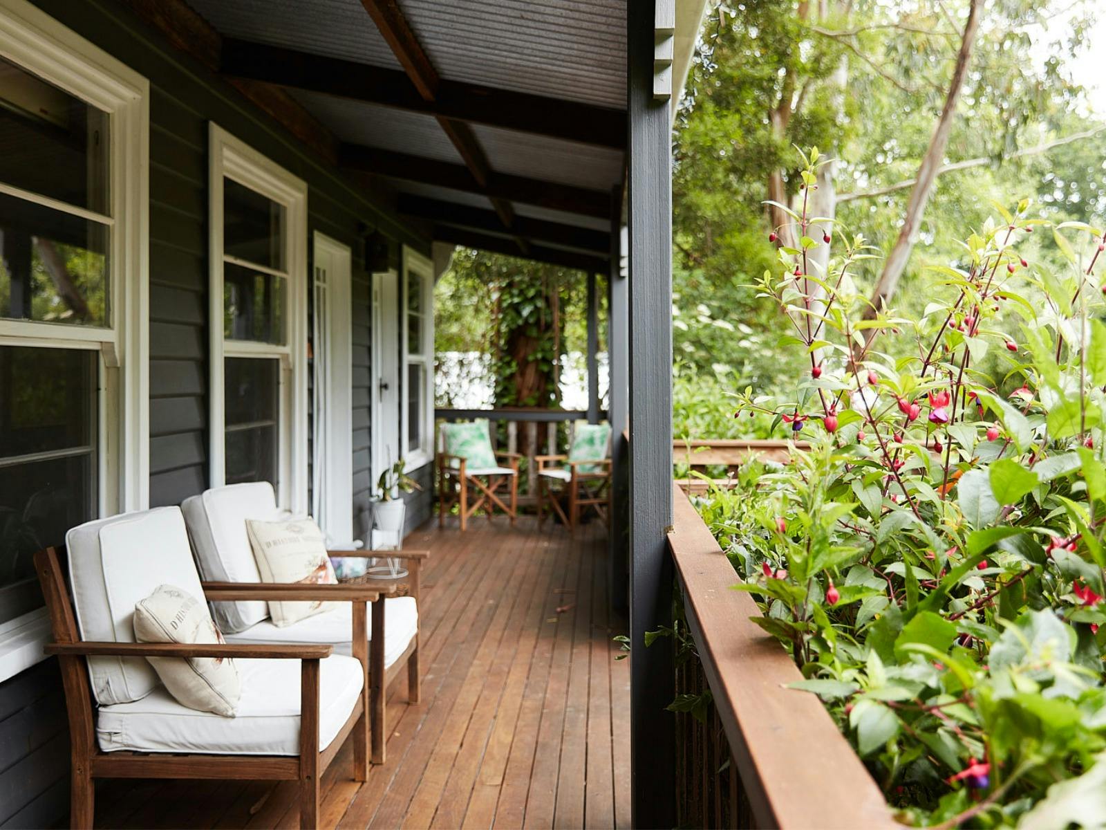 Large verandah overlooking extensive gardens