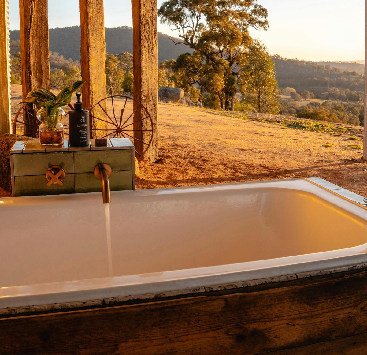 A warm soak in the bath in the cooler seasons or a cold plunge in the summer. Bath with a view