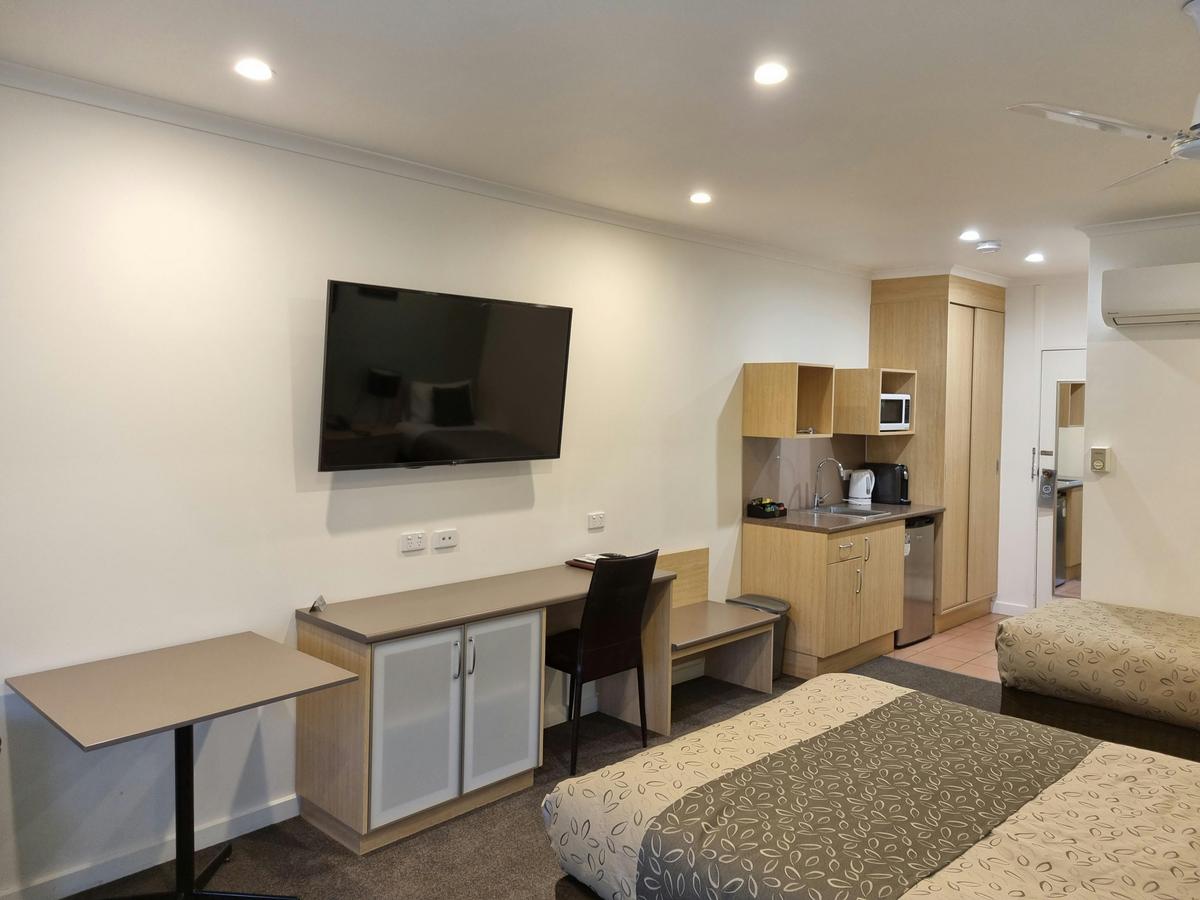 Smart TV, desk and dining table