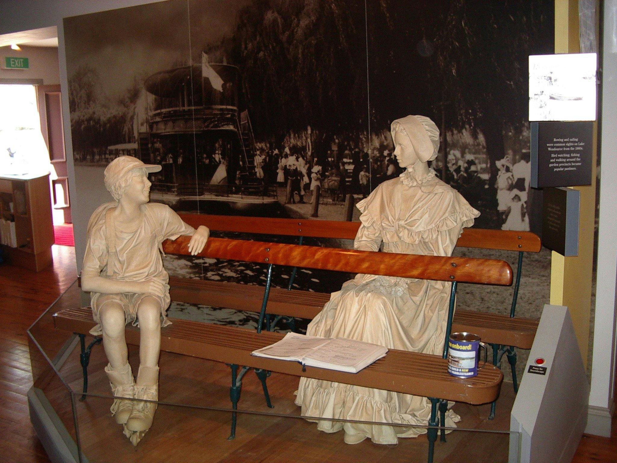 1880's period figurines on typical Paddle Boat seatingFigurine