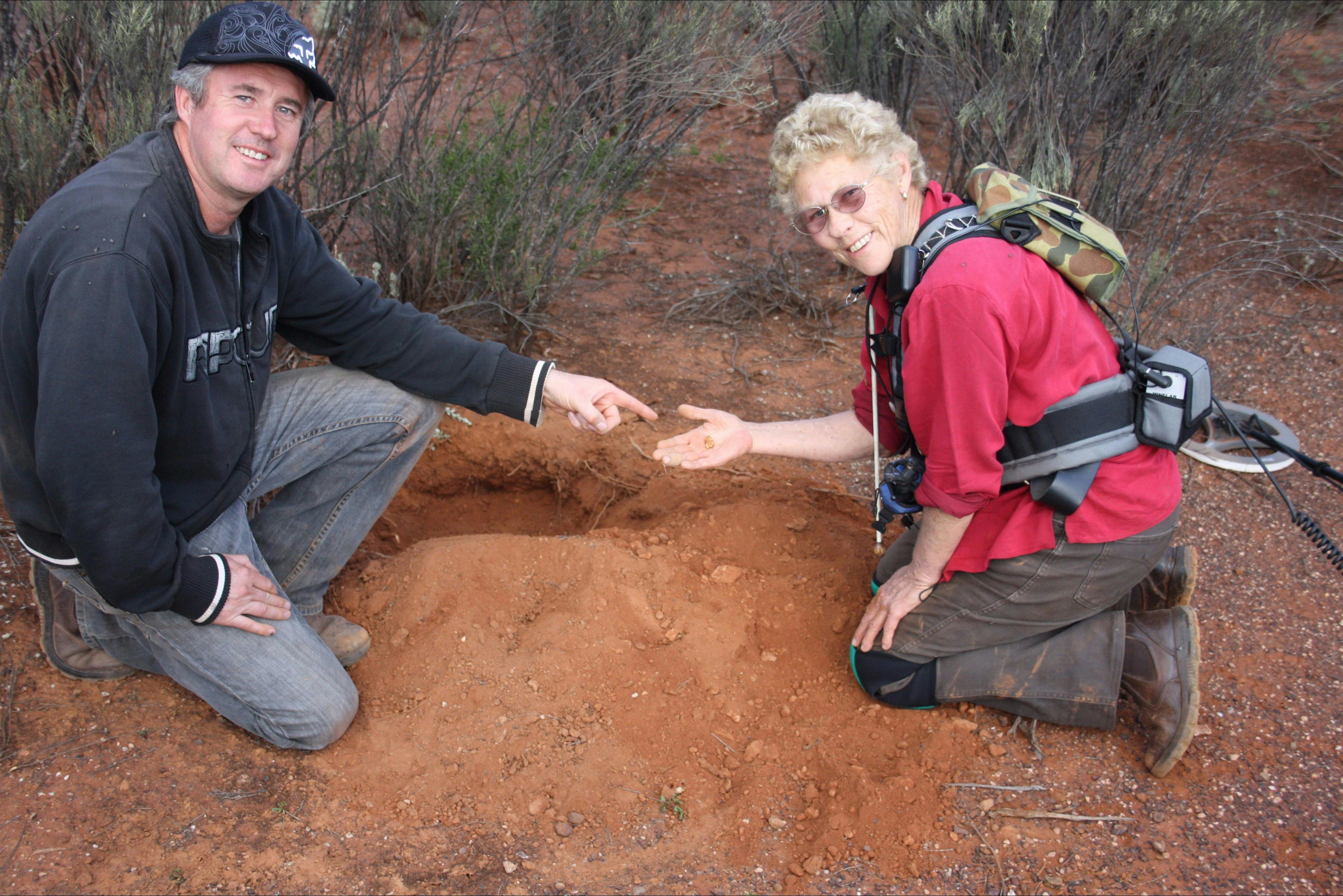 A lucky prospector digs up gold.
