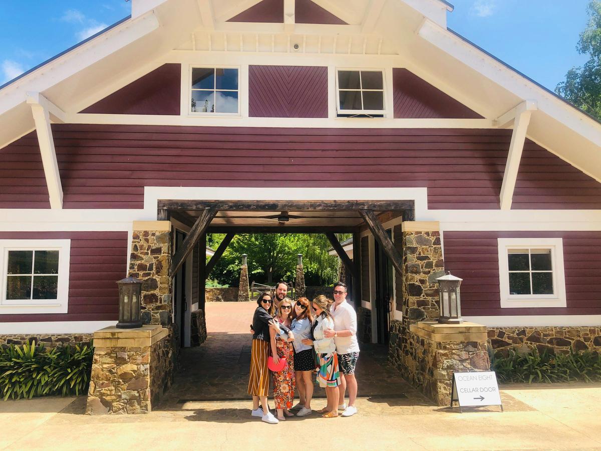 Guests Pictured at the Beautiful Ocean8 Vineyard