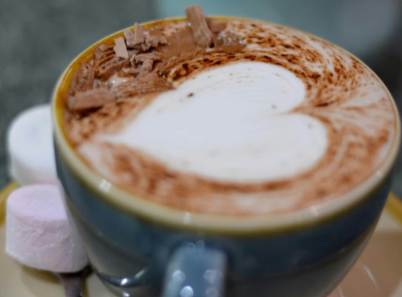 Hot chocolate in a cup with a heart  on the top
