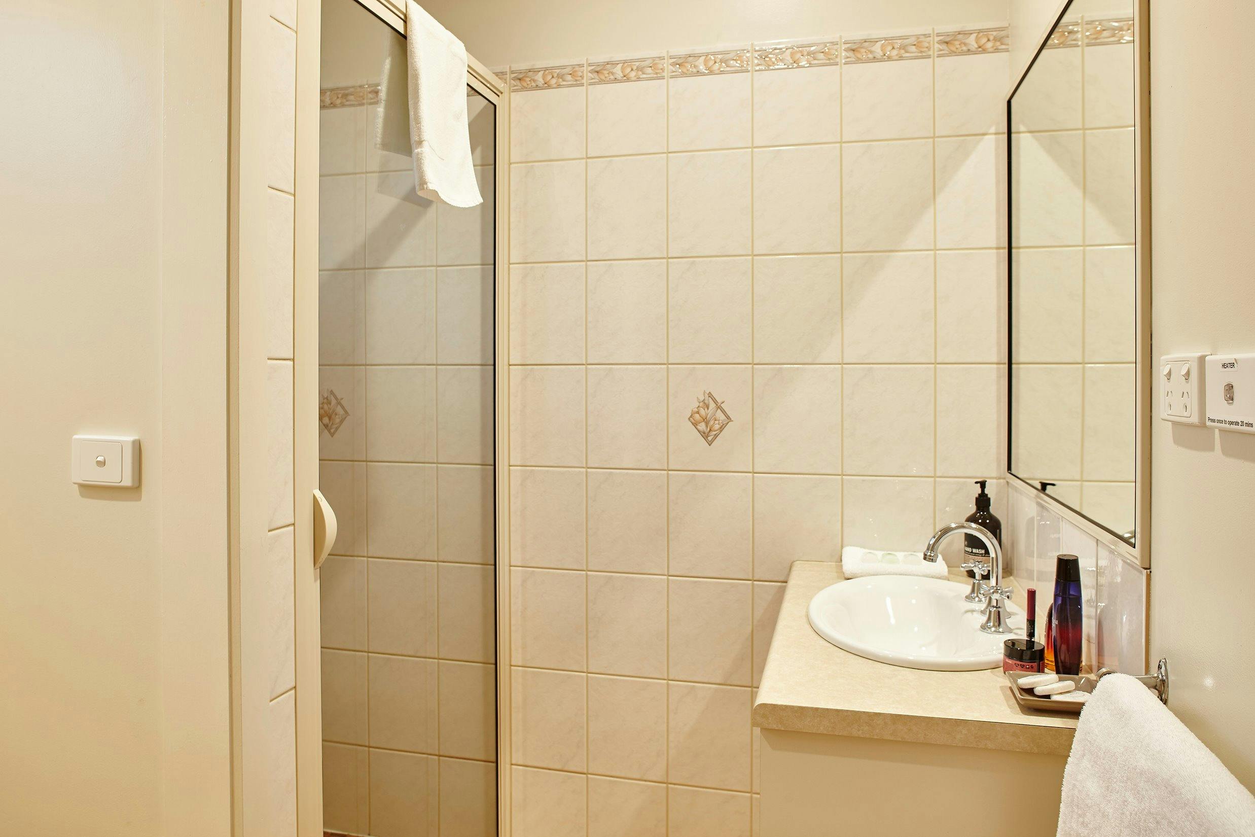 Bathroom with separate toilet.