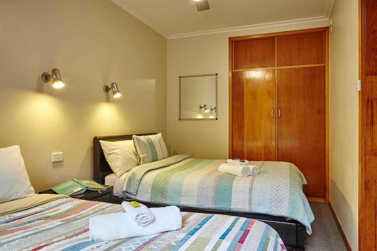 Second bedroom with double and single beds