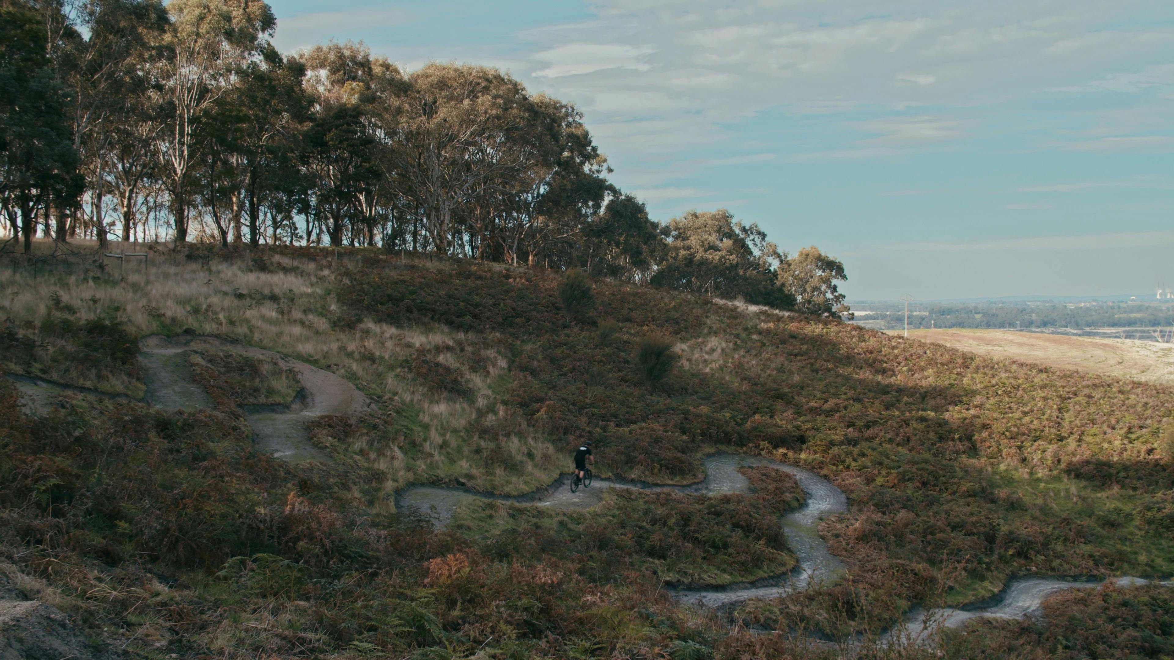 Bike Rider riding along a curved bike path