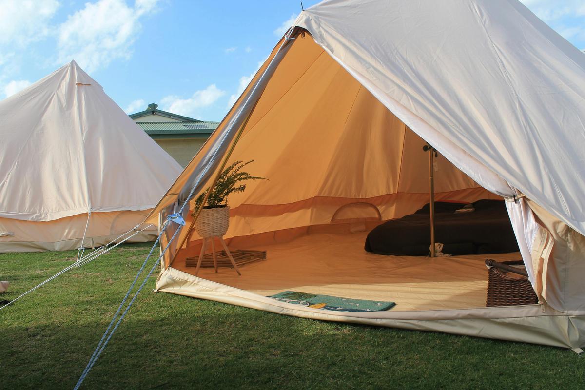 Our big beautiful bell tents set up with everything you need to make your stay cosy and comfortable.