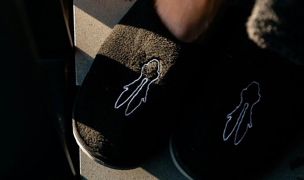 Complimentary slippers are provided for every room