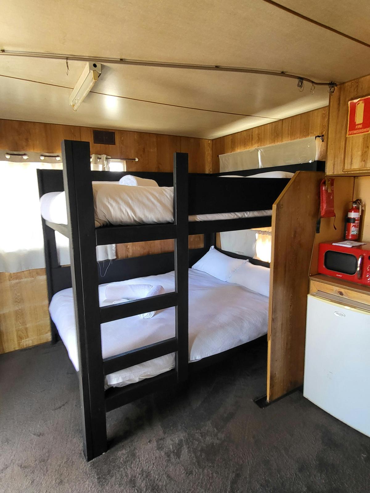 Cozy bunk beds in Cabin 3 at Kangaroo Lake Hotel Motel