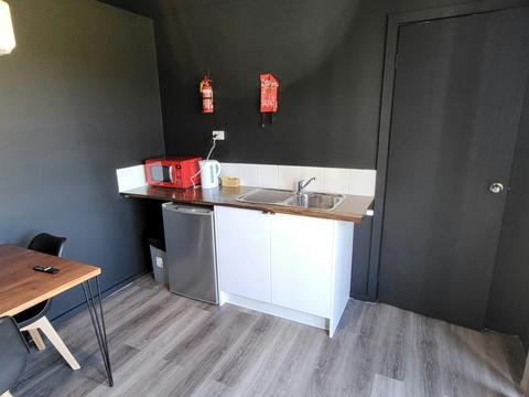 The fully equipped kitchen in Cabin 15 is perfect for your cooking needs