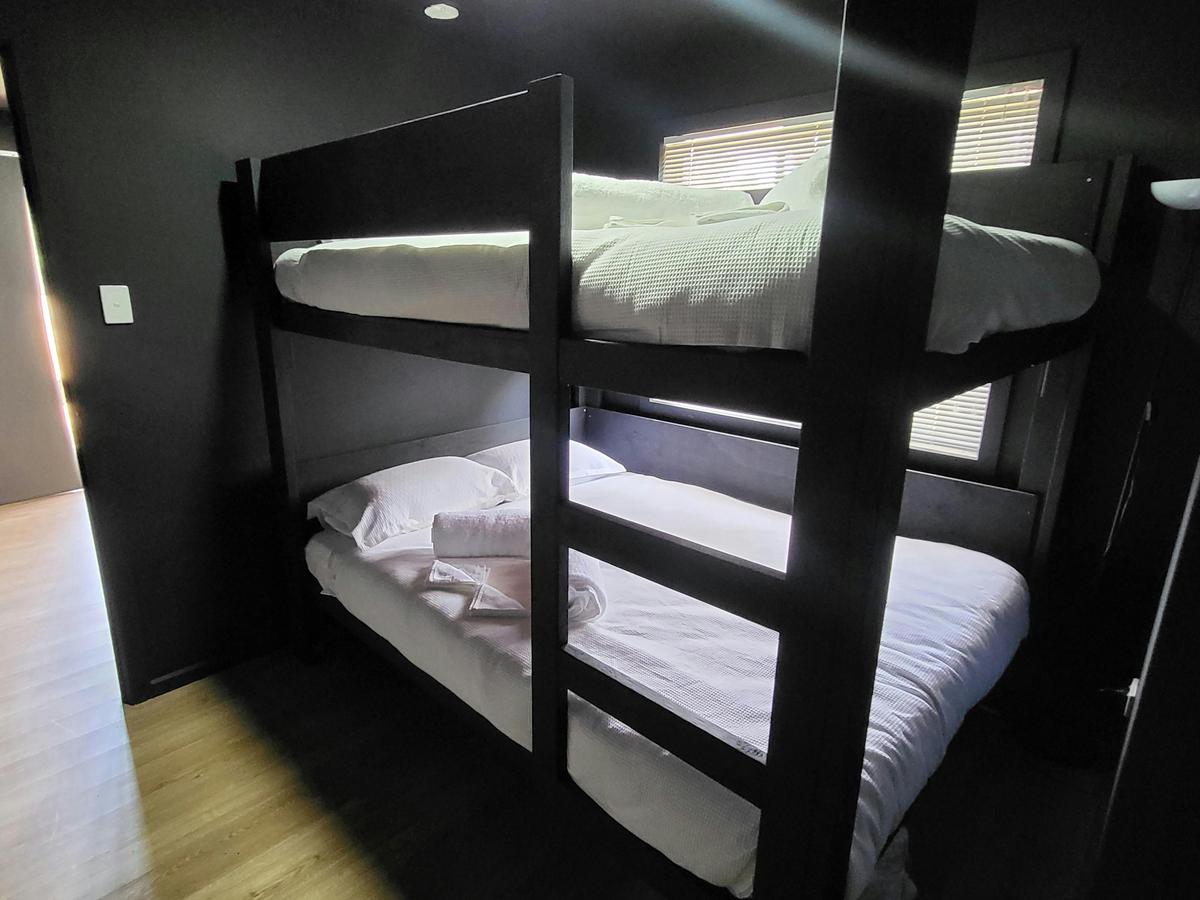 Cabin 11 includes comfortable bunk beds, perfect for families or groups