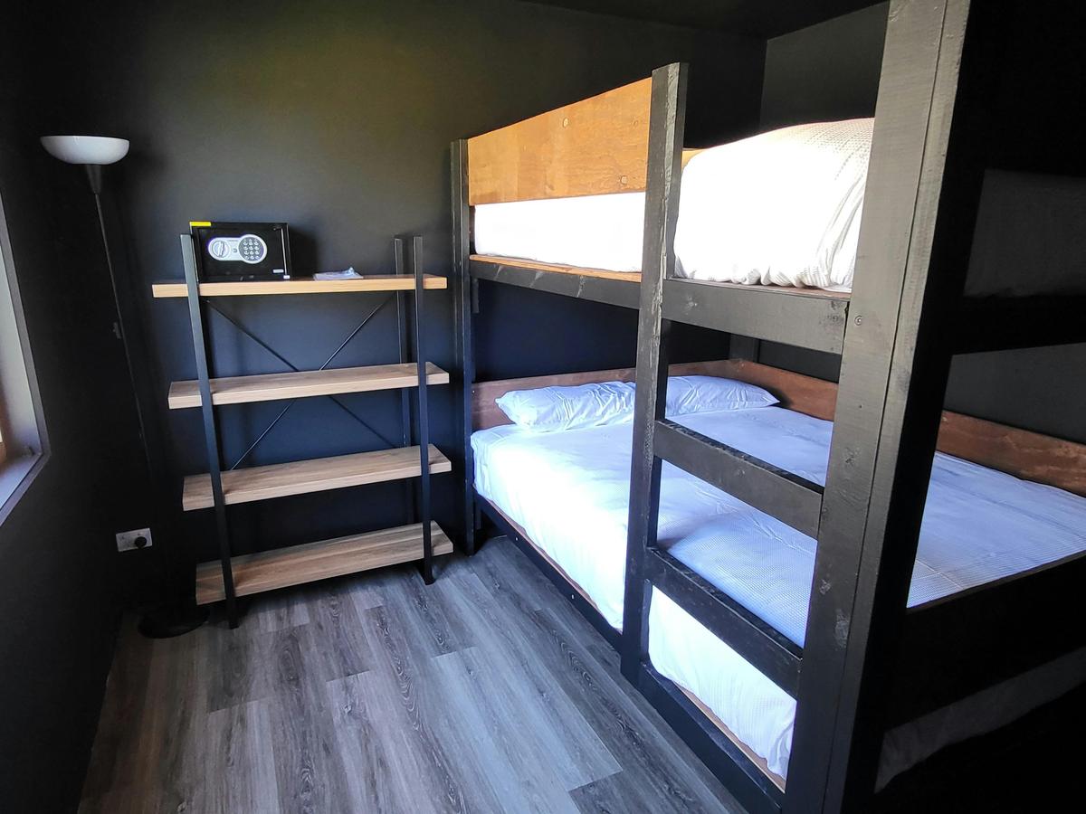 Comfortable bunk beds in Cabin 15, ideal for a relaxing stay