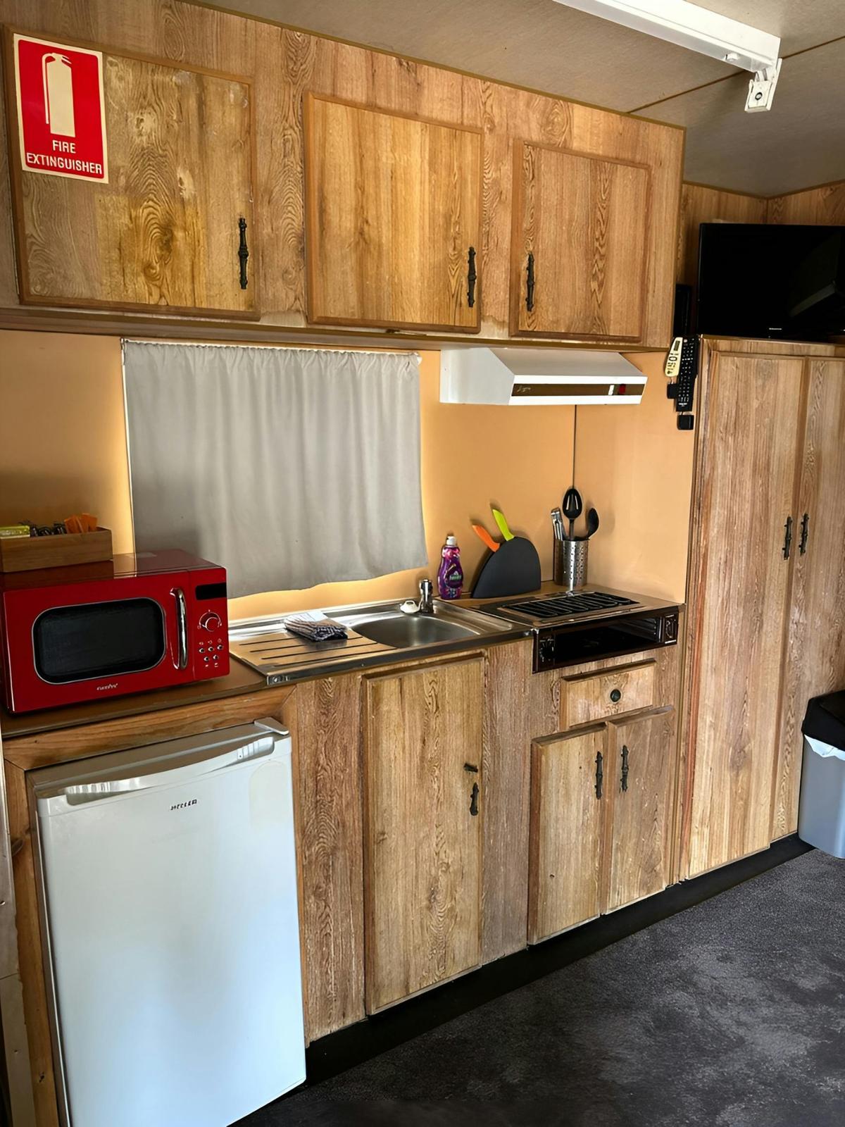 Cabin 1 features a cozy kitchen with all essentials for your stay