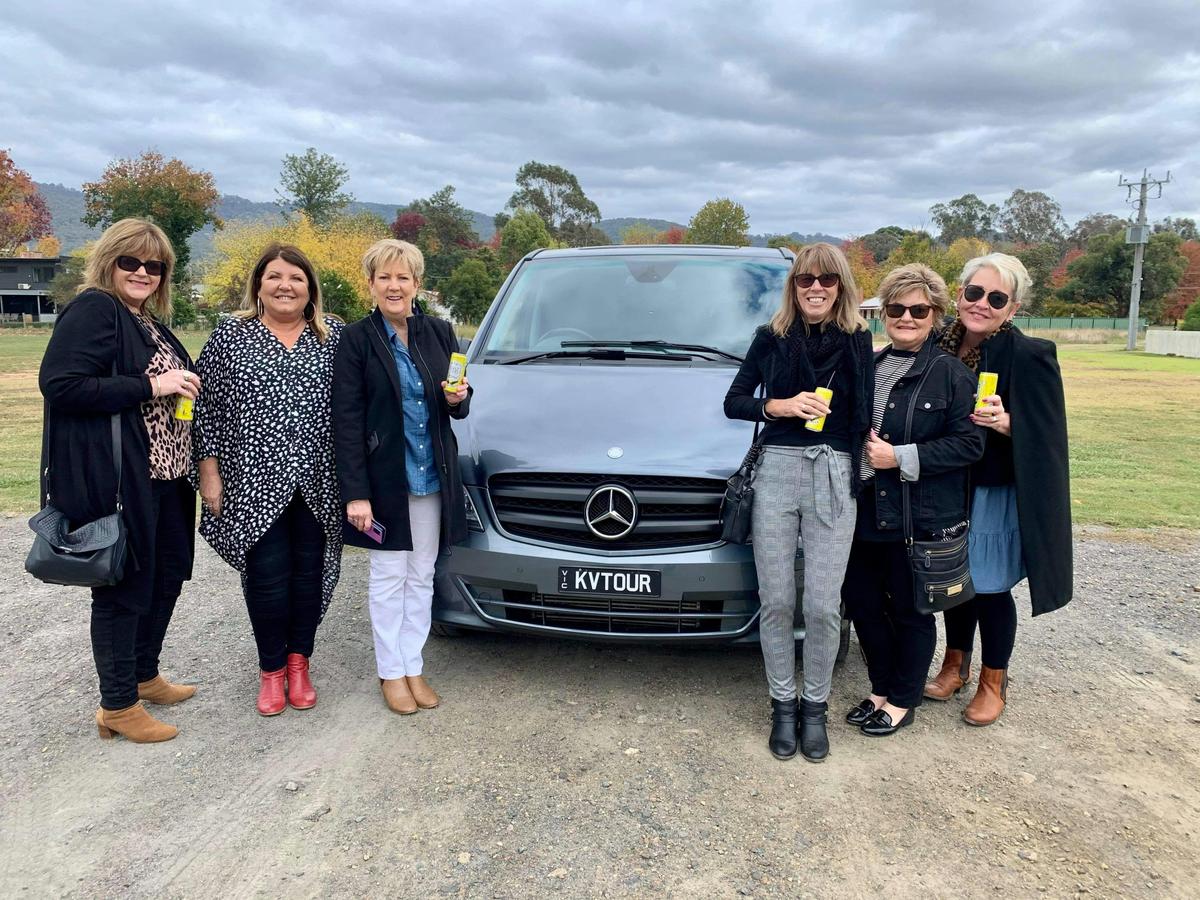 Our luxury vehicle and happy guests.