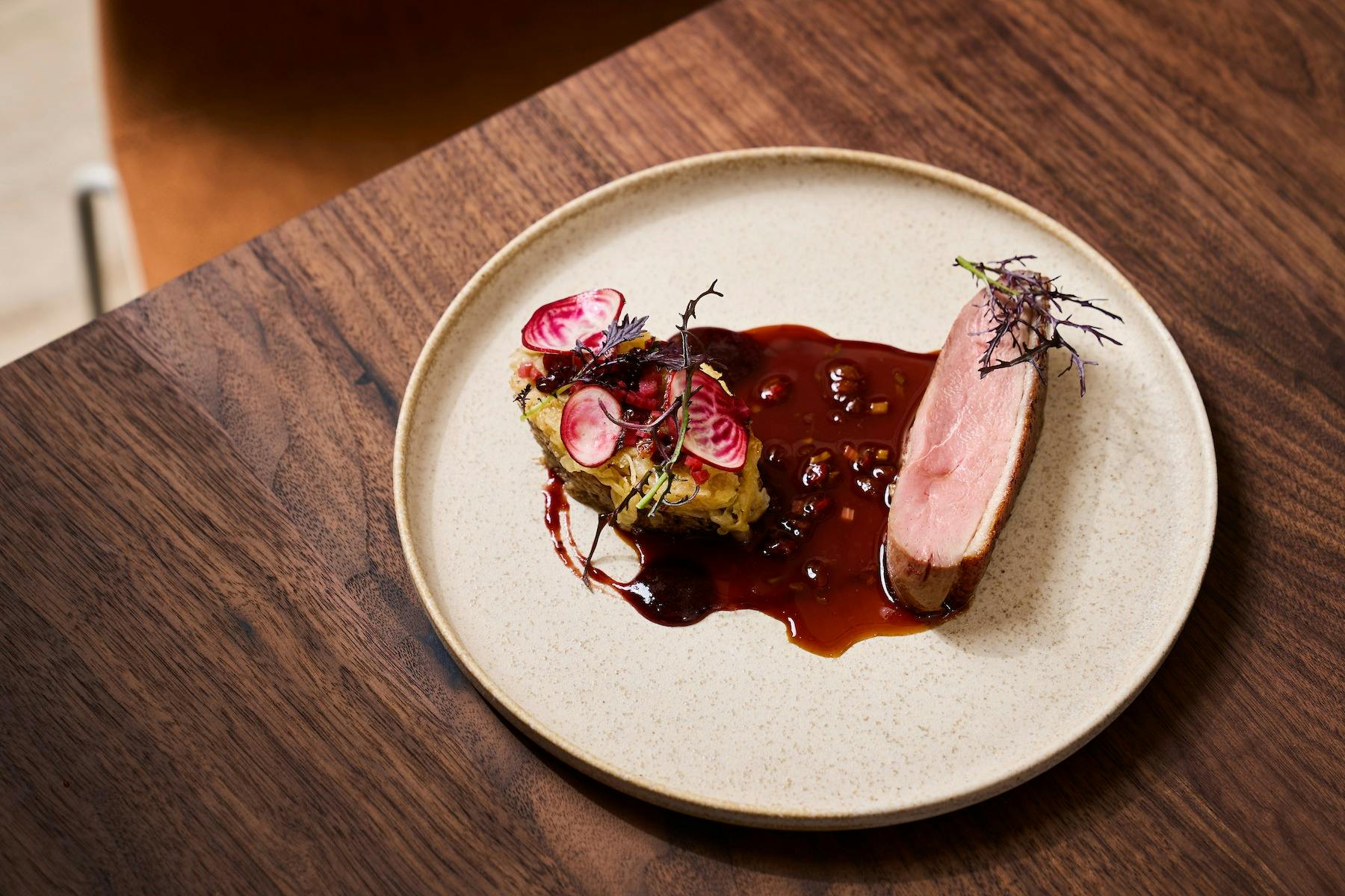 Central Highlands corn-fed duck, Tasmanian wolf berries and preserved plum sauce