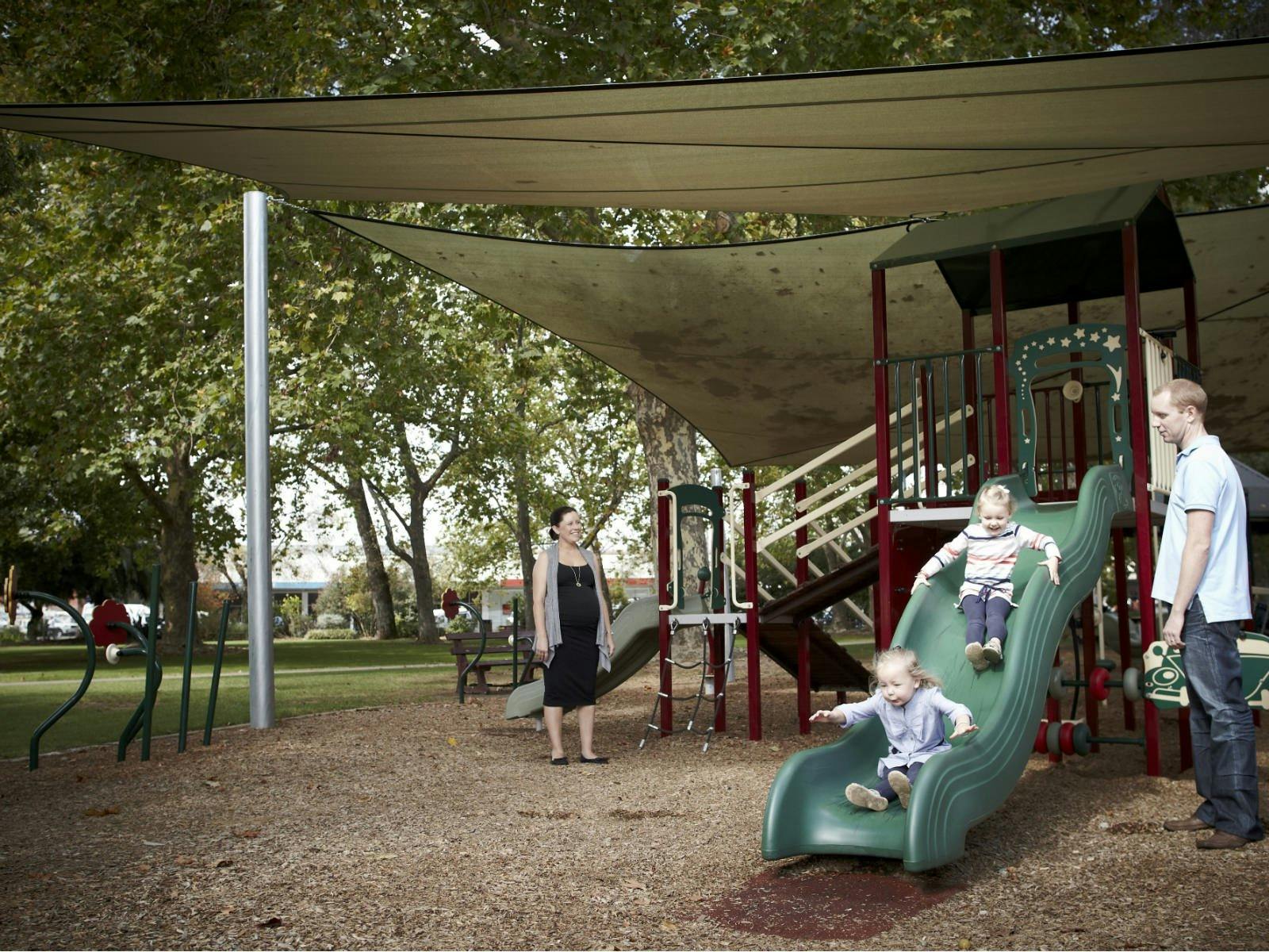 Family using playground