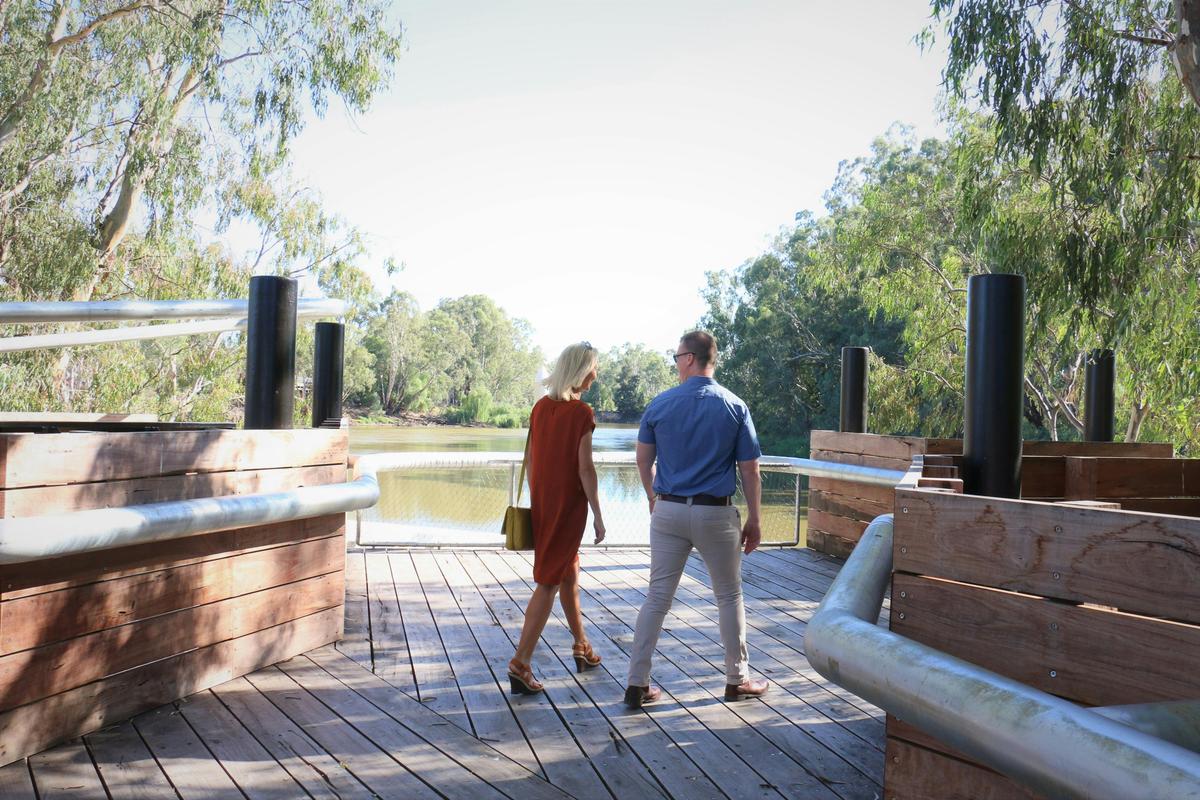 Couple walking on Koondrook Wharf