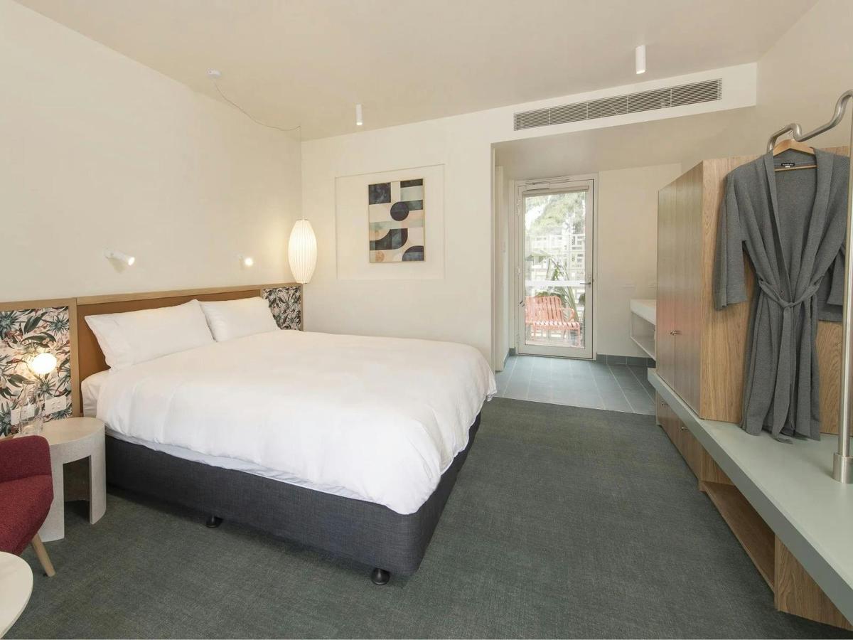 Kar-Rama Super Easy Access Room with double bed and bathrobe on a hanger